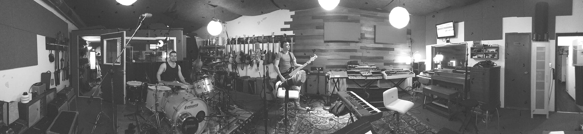 Marcus and Braden recording in the live room at Ice Cream Factory Studio in Austin, TX, surrounded by vintage gear