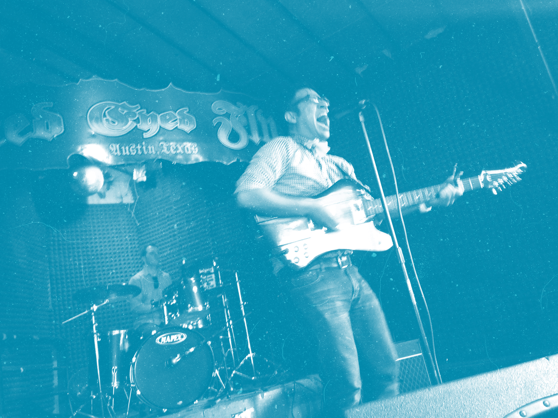 Antonio and Lloyd performing at Red Eyed Fly in Austin, TX with The Imaginary Friends