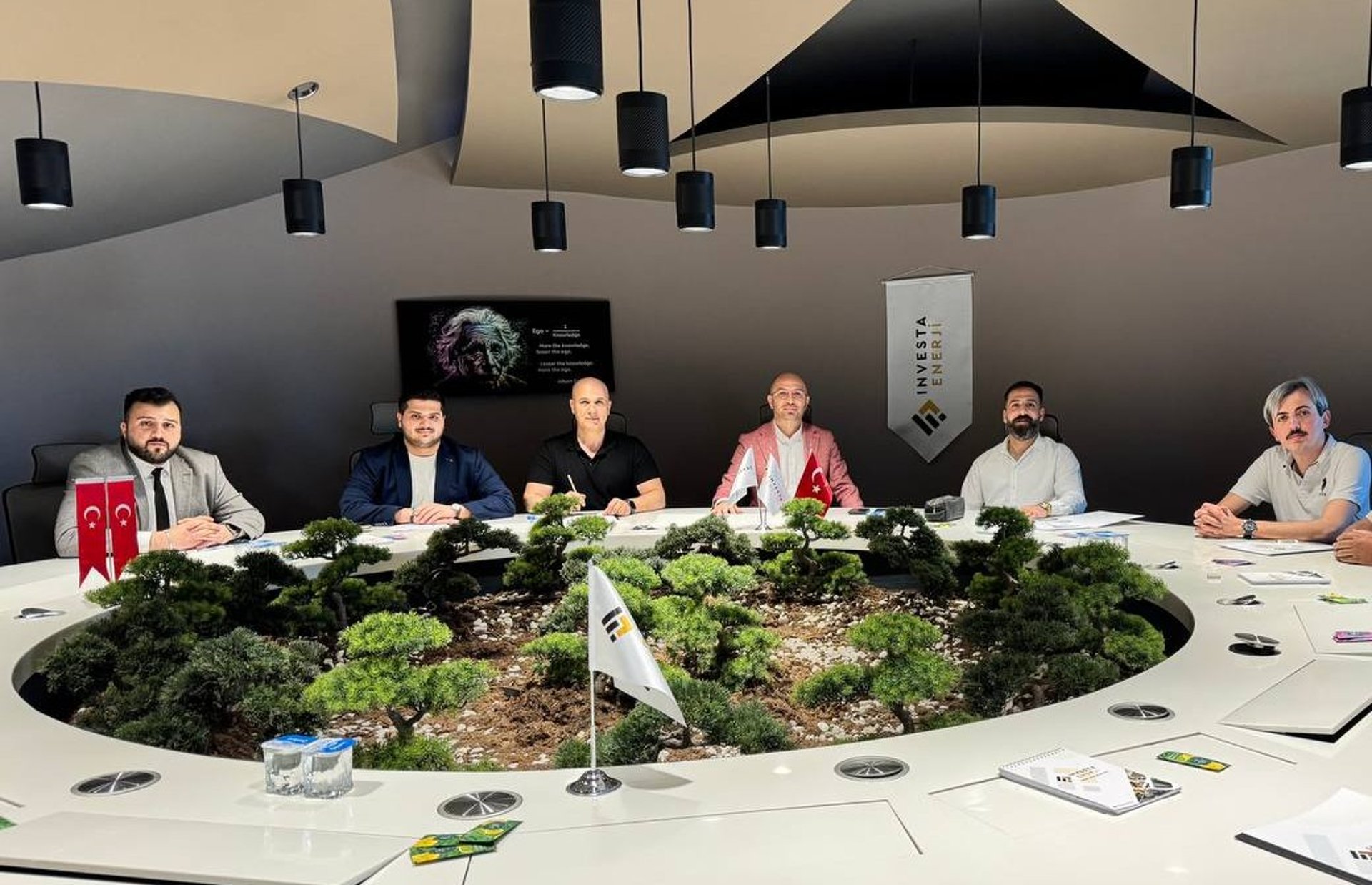 an abstract photo of a curved building with a blue sky in the background