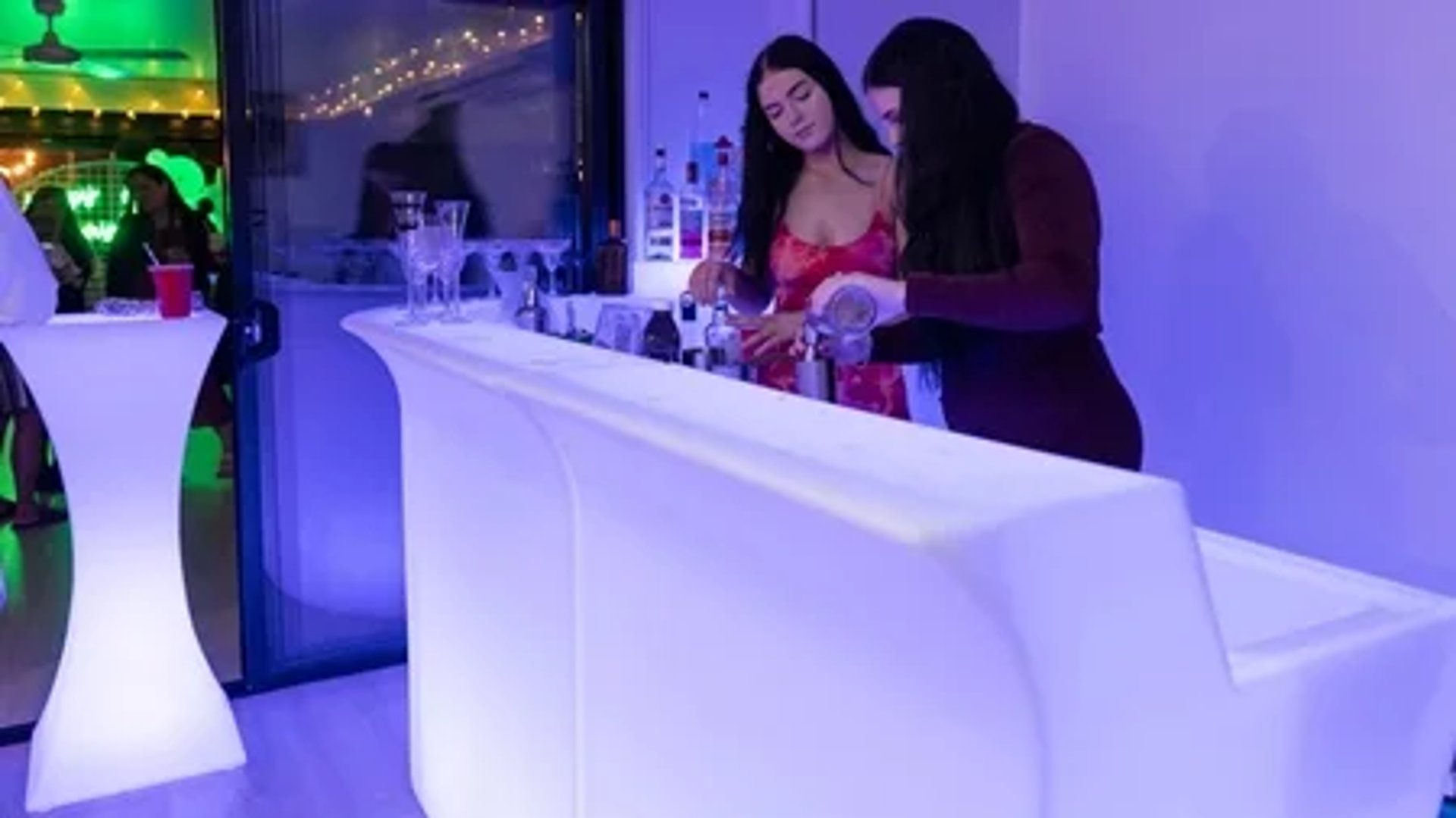 Vow renewal event in Redland Bay hired glow bar, cocktail tables and neon.