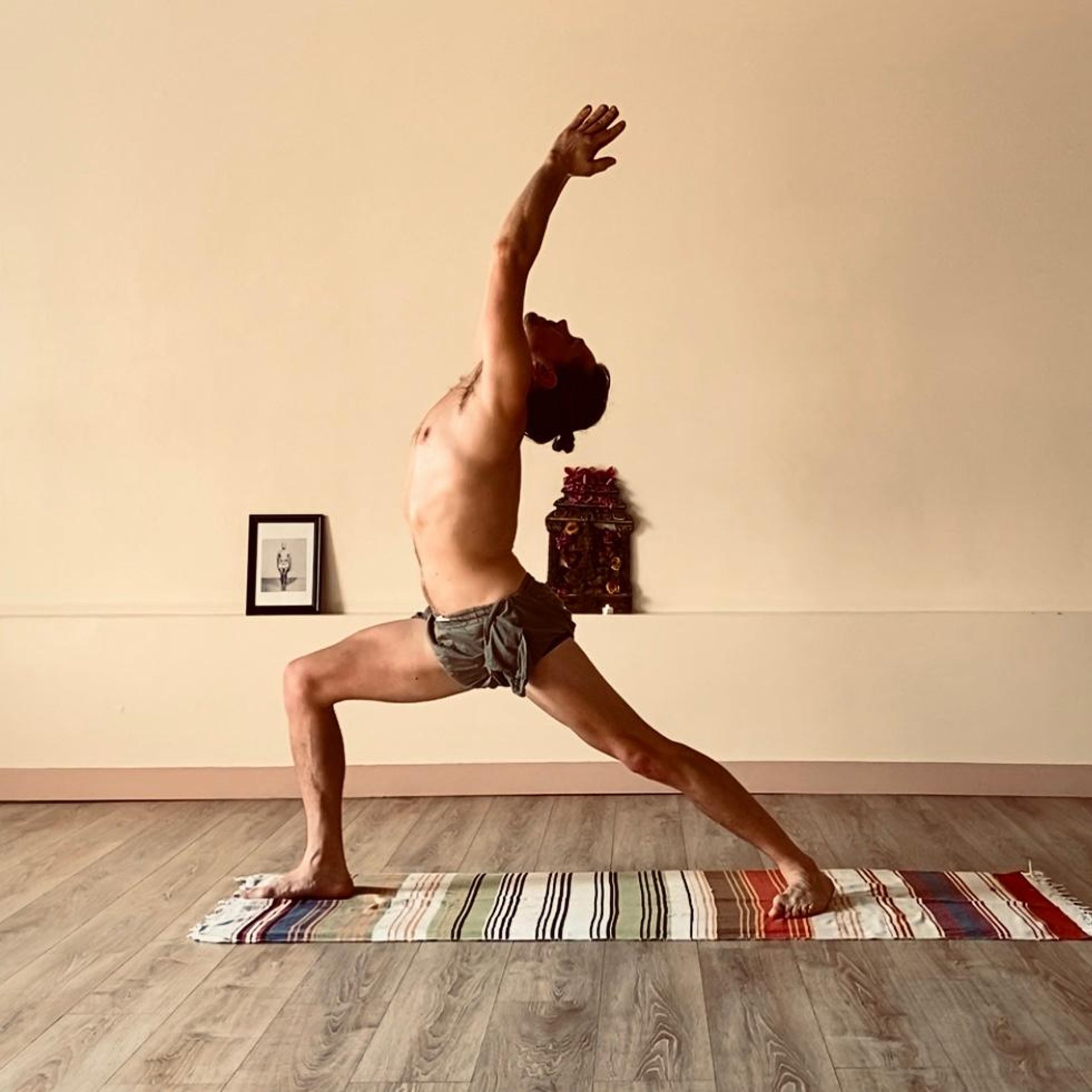 an abstract photo of a curved building with a blue sky in the background