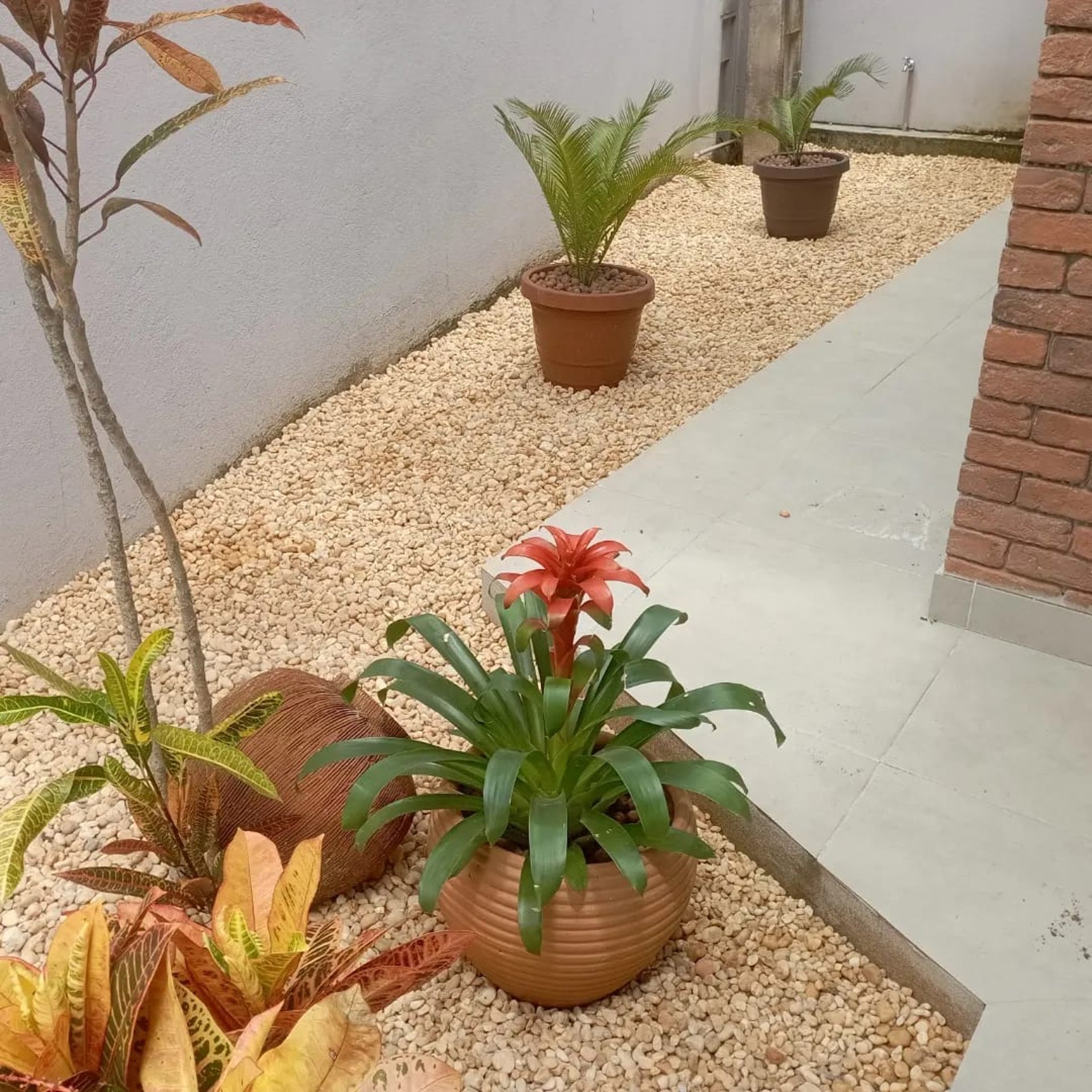 woman wearing yellow long-sleeved dress under white clouds and blue sky during daytime