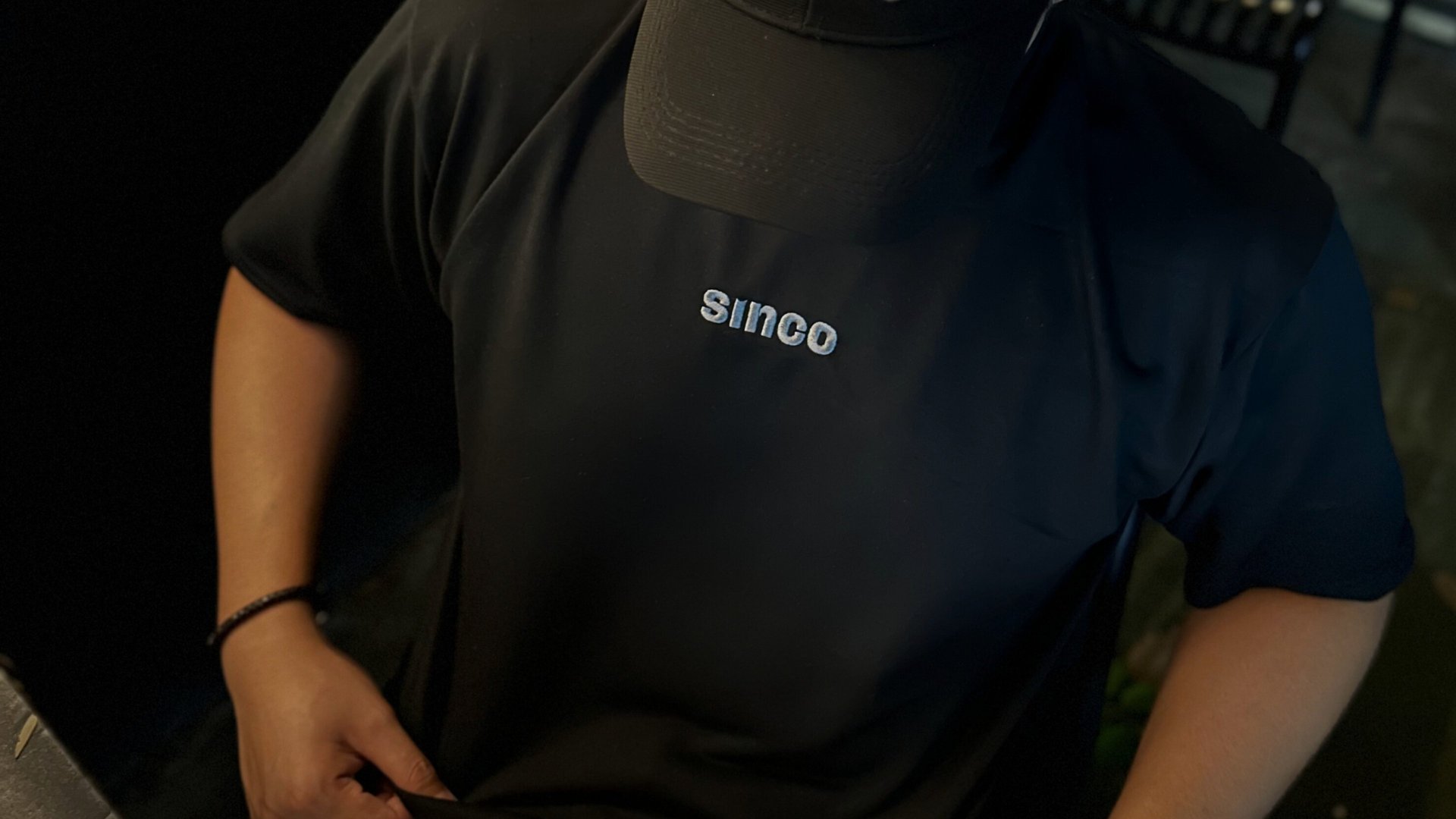 an abstract photo of a curved building with a blue sky in the background