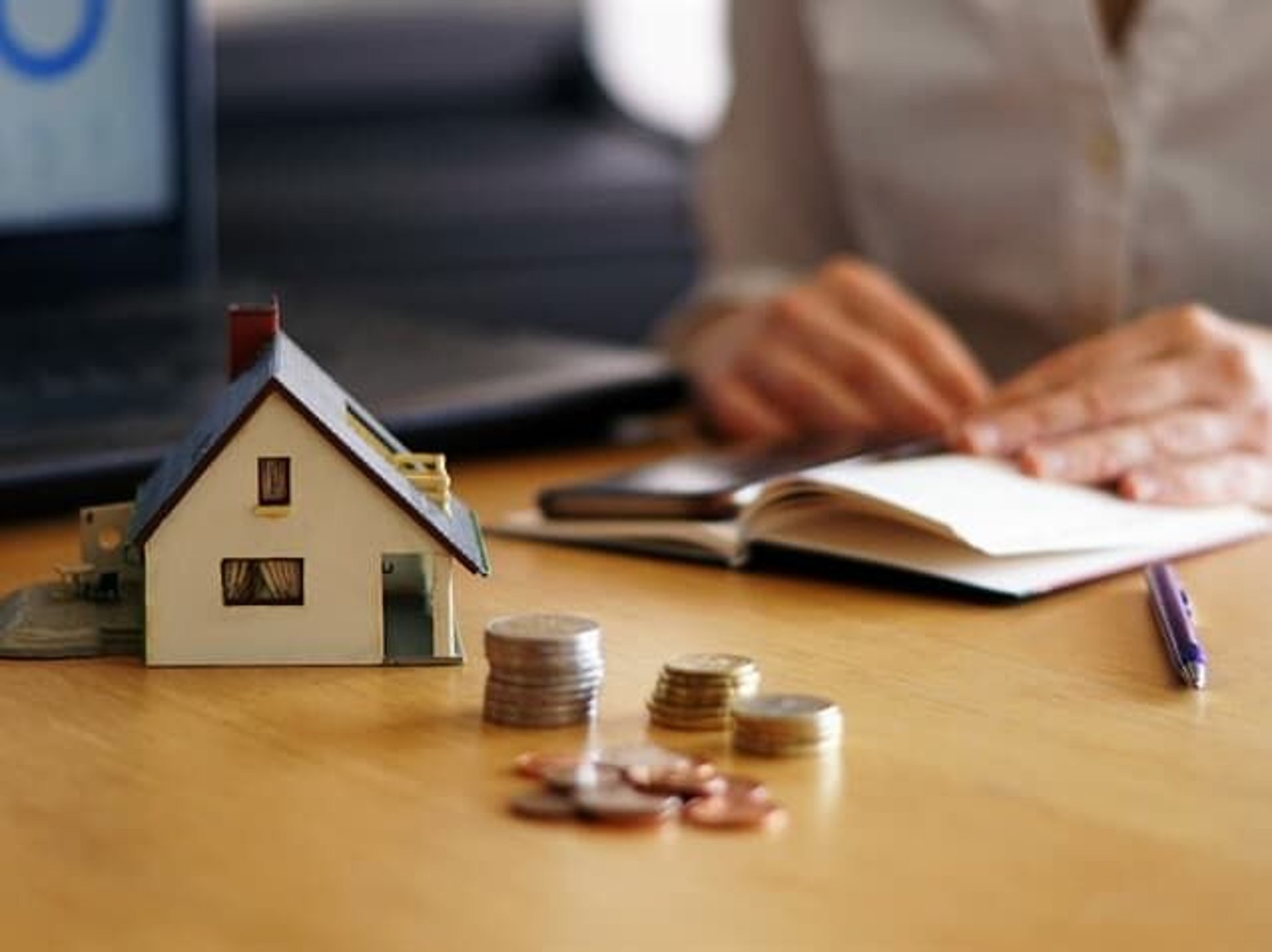 an abstract photo of a curved building with a blue sky in the background