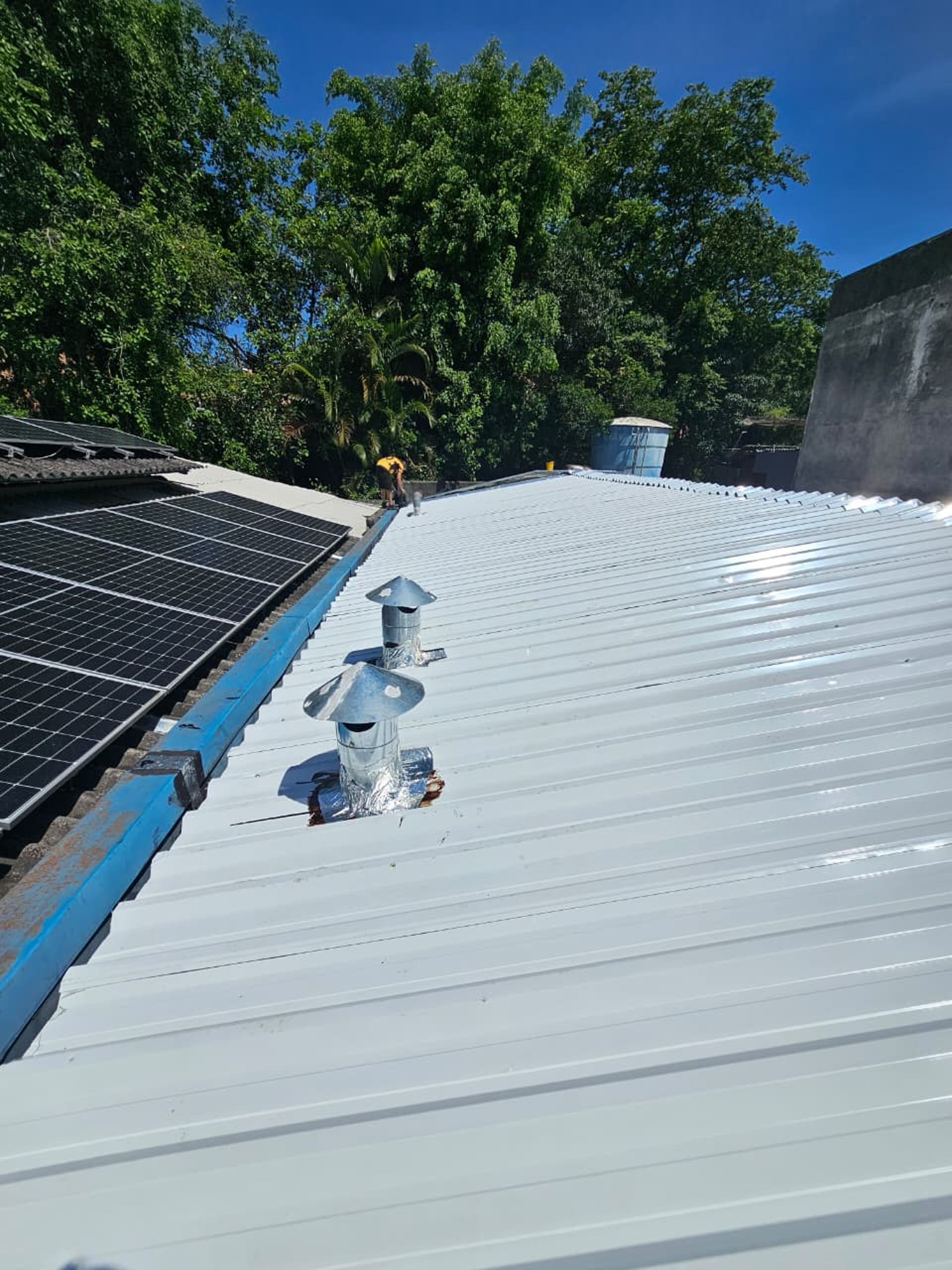 woman wearing yellow long-sleeved dress under white clouds and blue sky during daytime