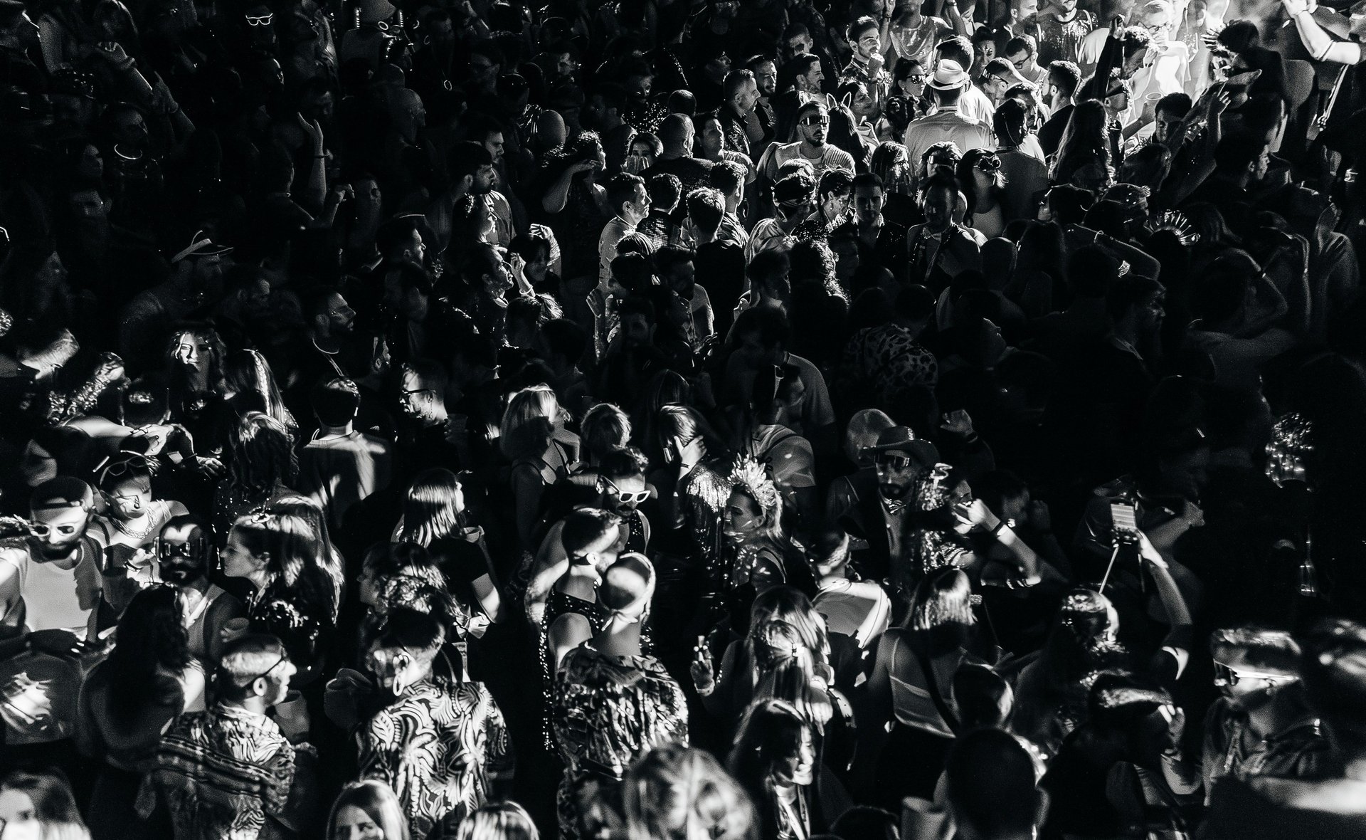 an abstract photo of a curved building with a blue sky in the background