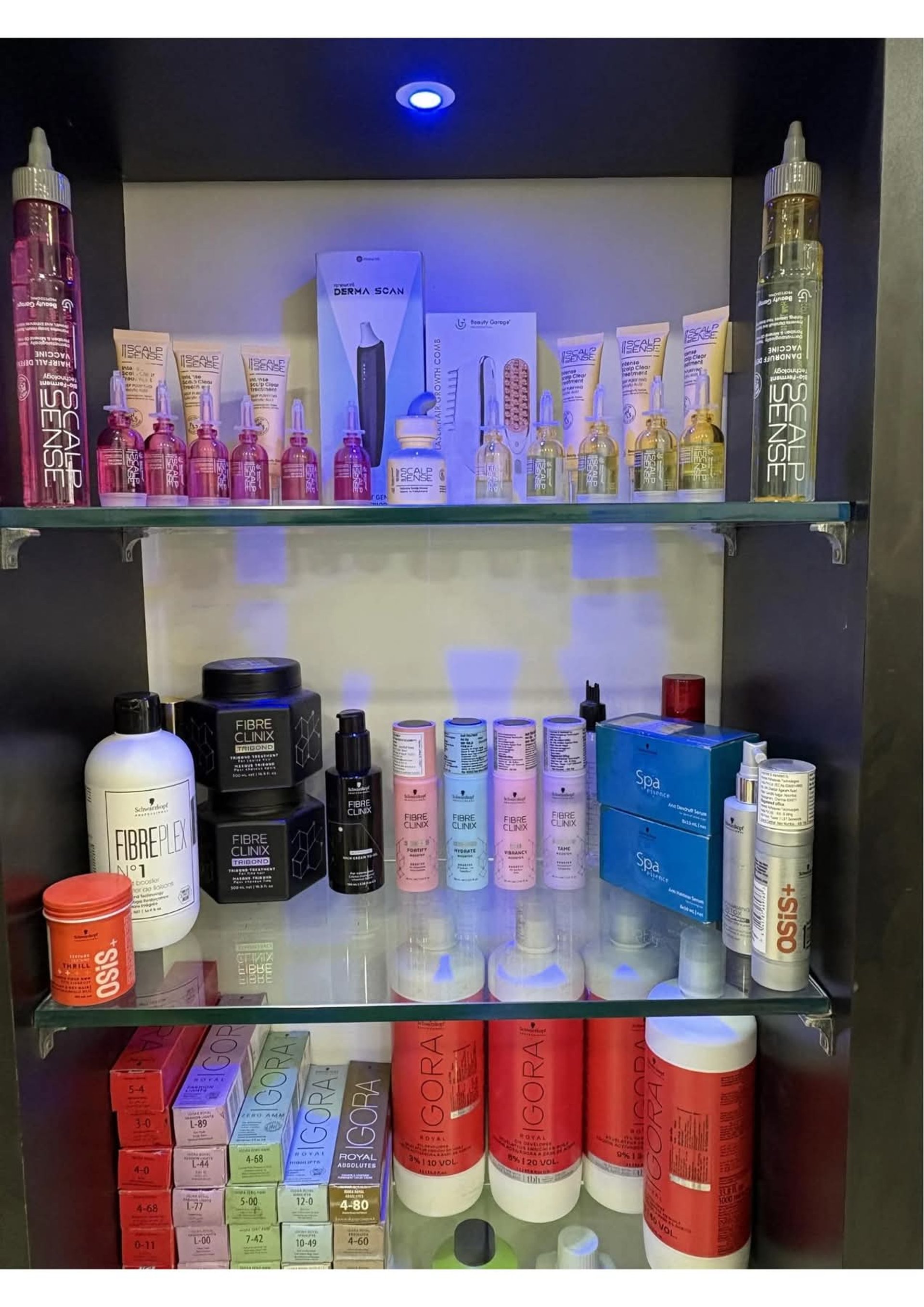 black office rolling chair beside white wooden desk