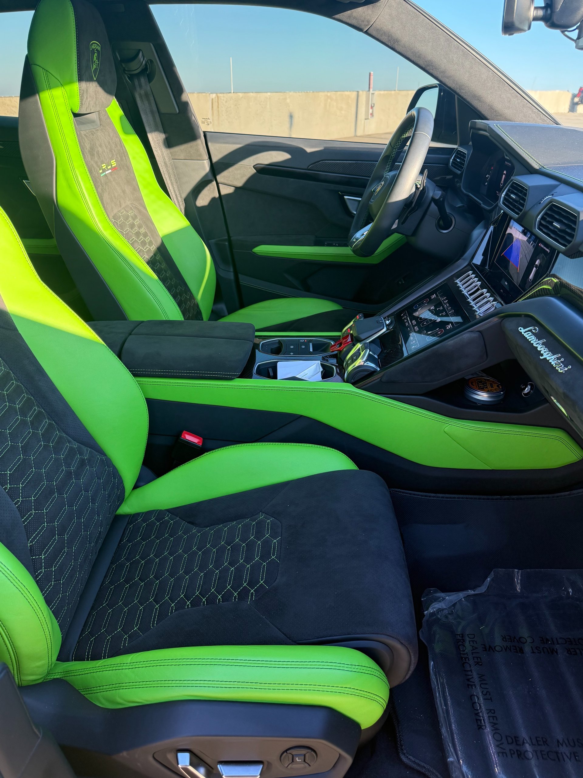red ferrari 458 italia parked on parking lot during daytime