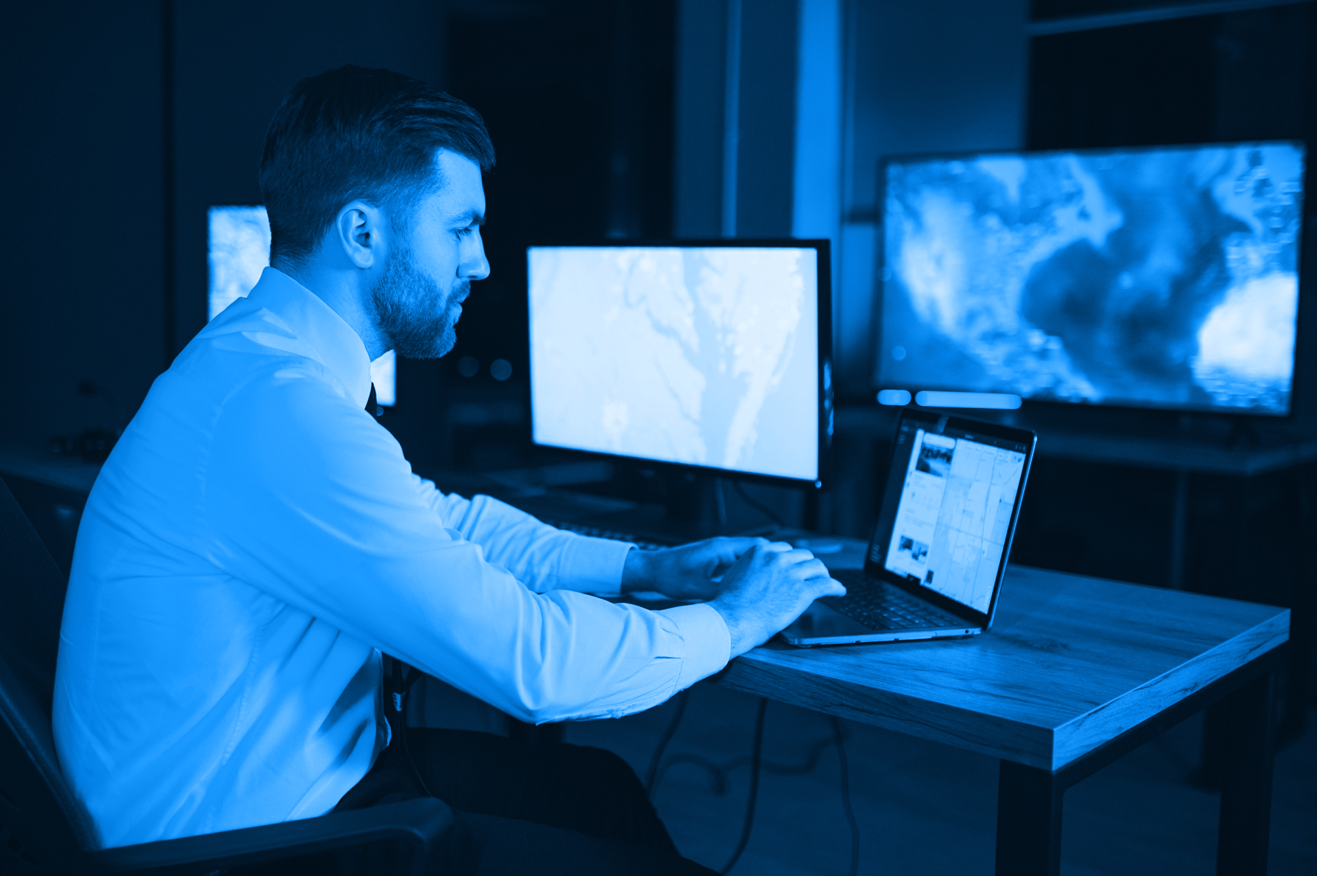 an abstract photo of a curved building with a blue sky in the background