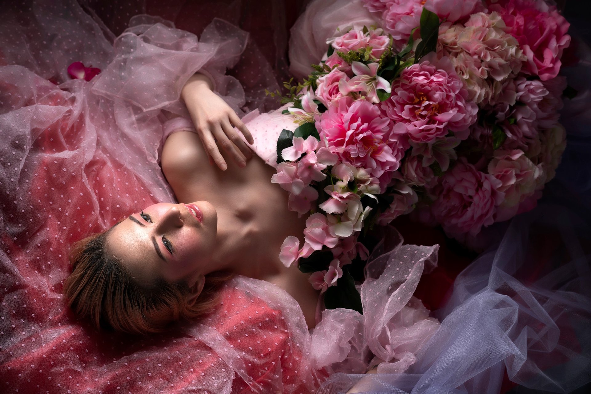 woman wearing yellow long-sleeved dress under white clouds and blue sky during daytime