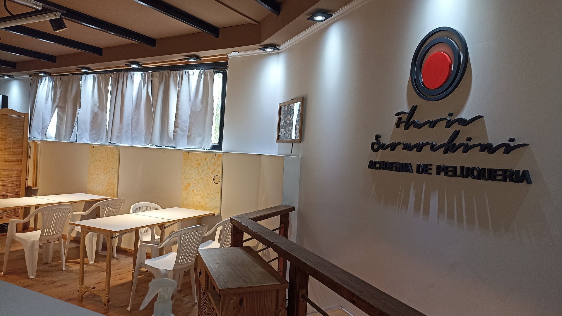 an abstract photo of a curved building with a blue sky in the background