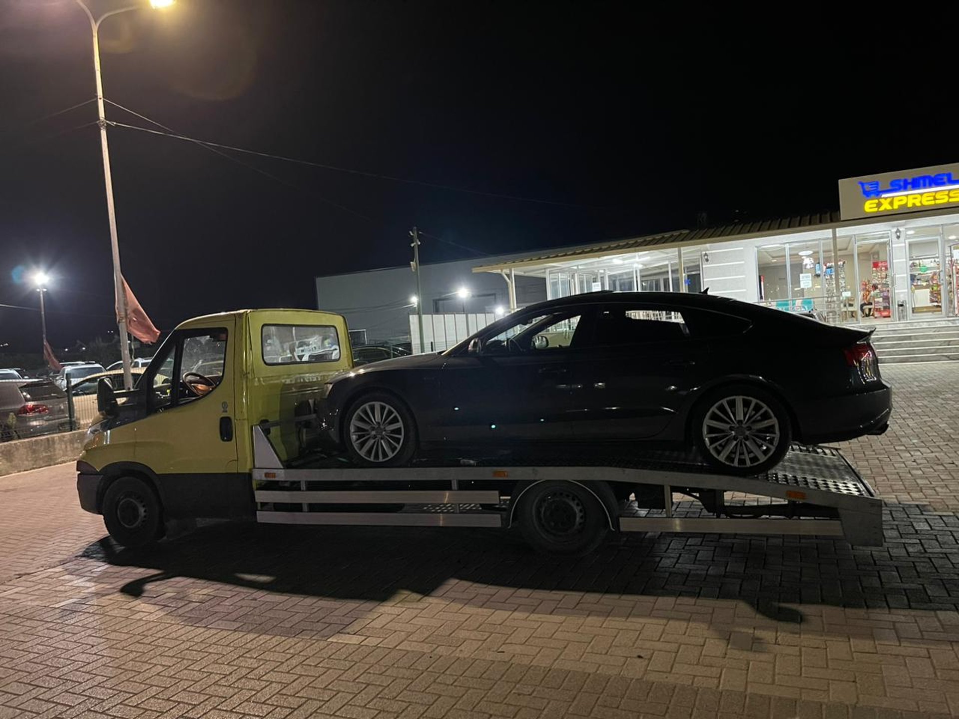 black and brown leather padded tub sofa