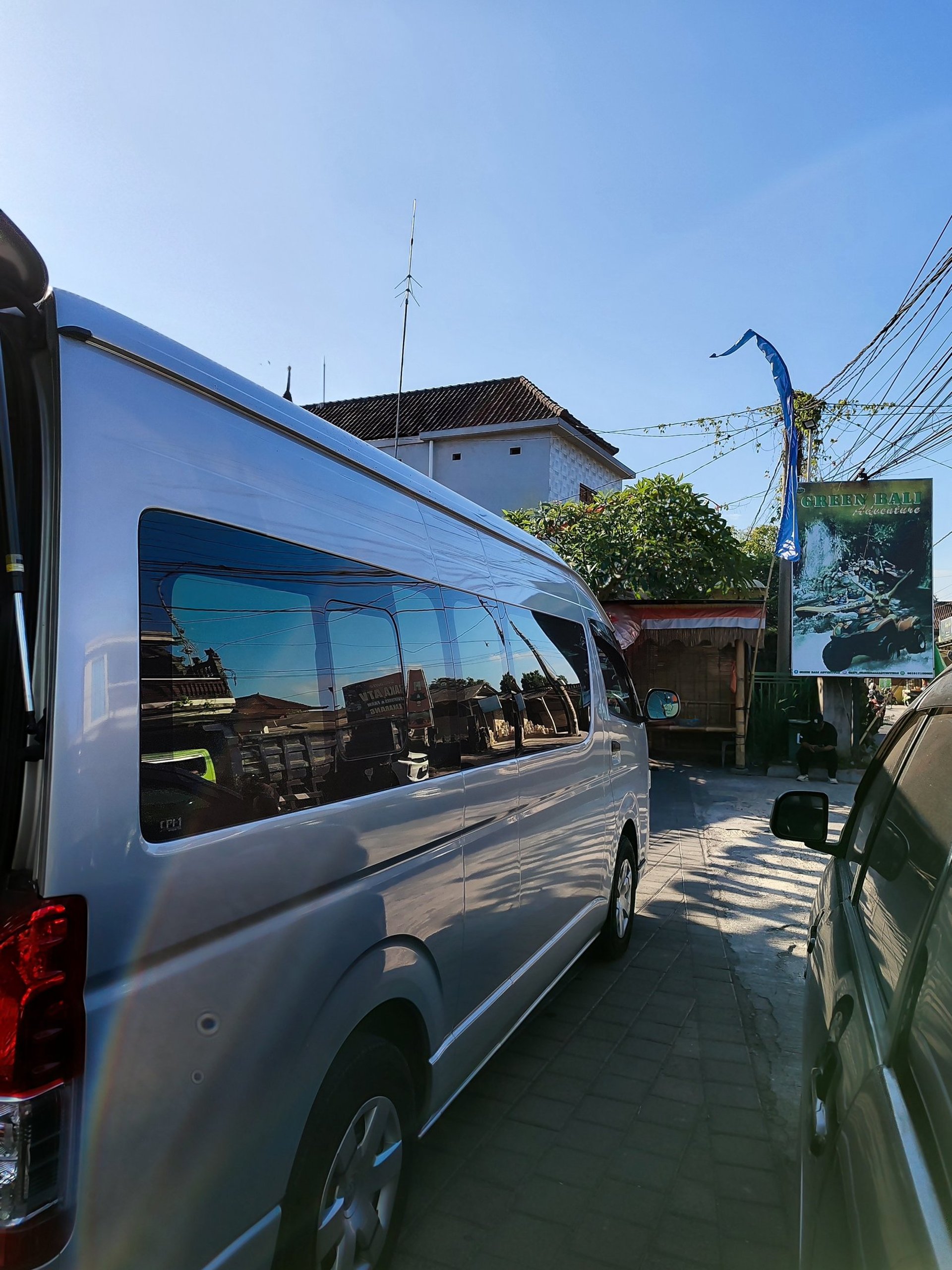 woman wearing yellow long-sleeved dress under white clouds and blue sky during daytime