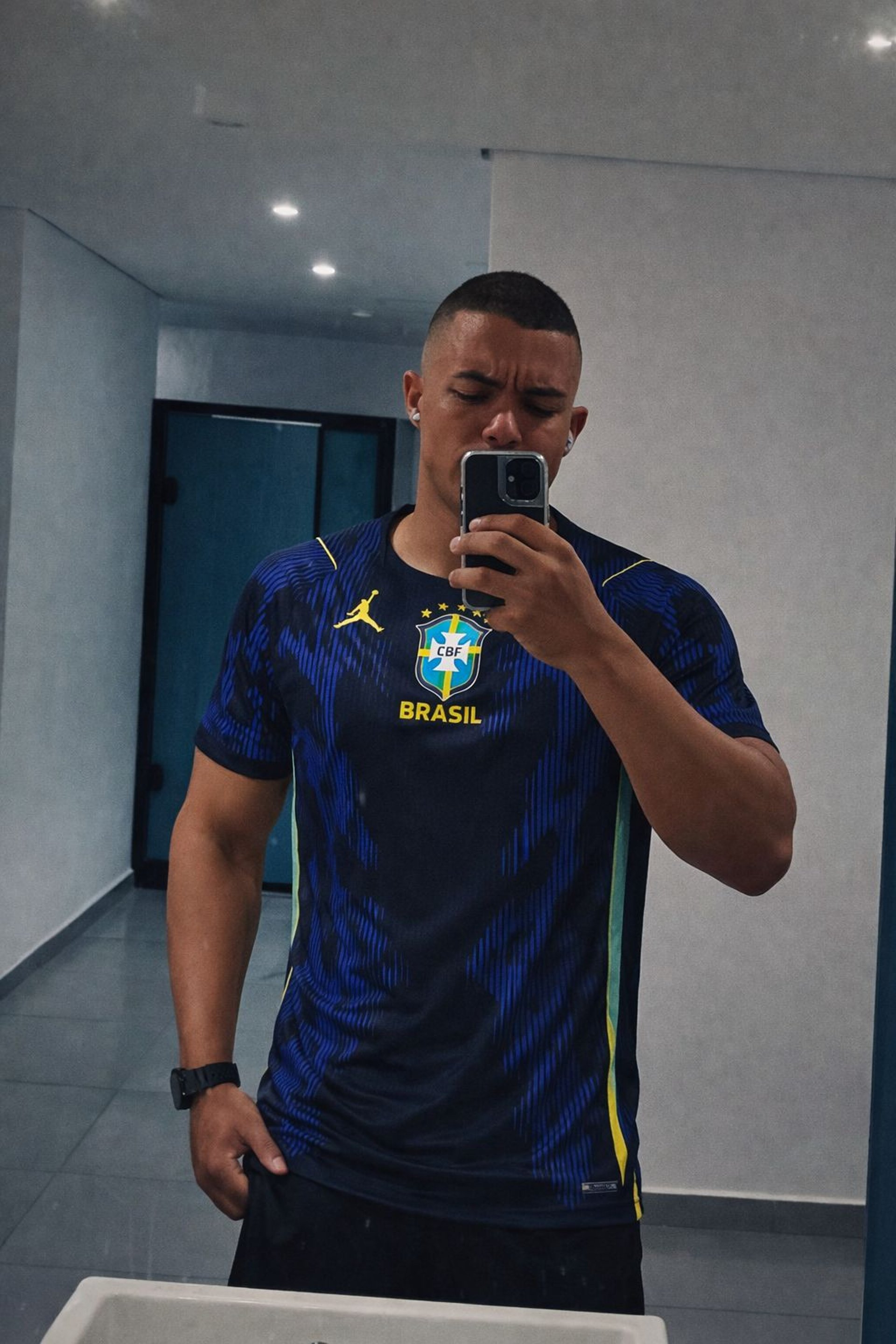 an abstract photo of a curved building with a blue sky in the background