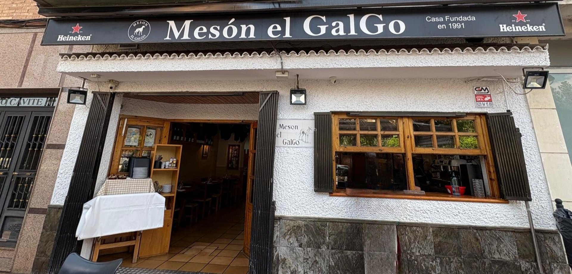 black and brown leather padded tub sofa