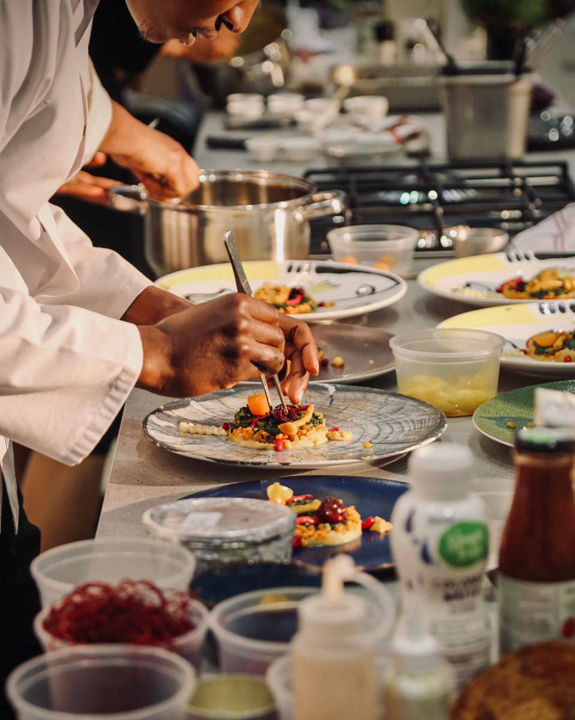 an abstract photo of a curved building with a blue sky in the background