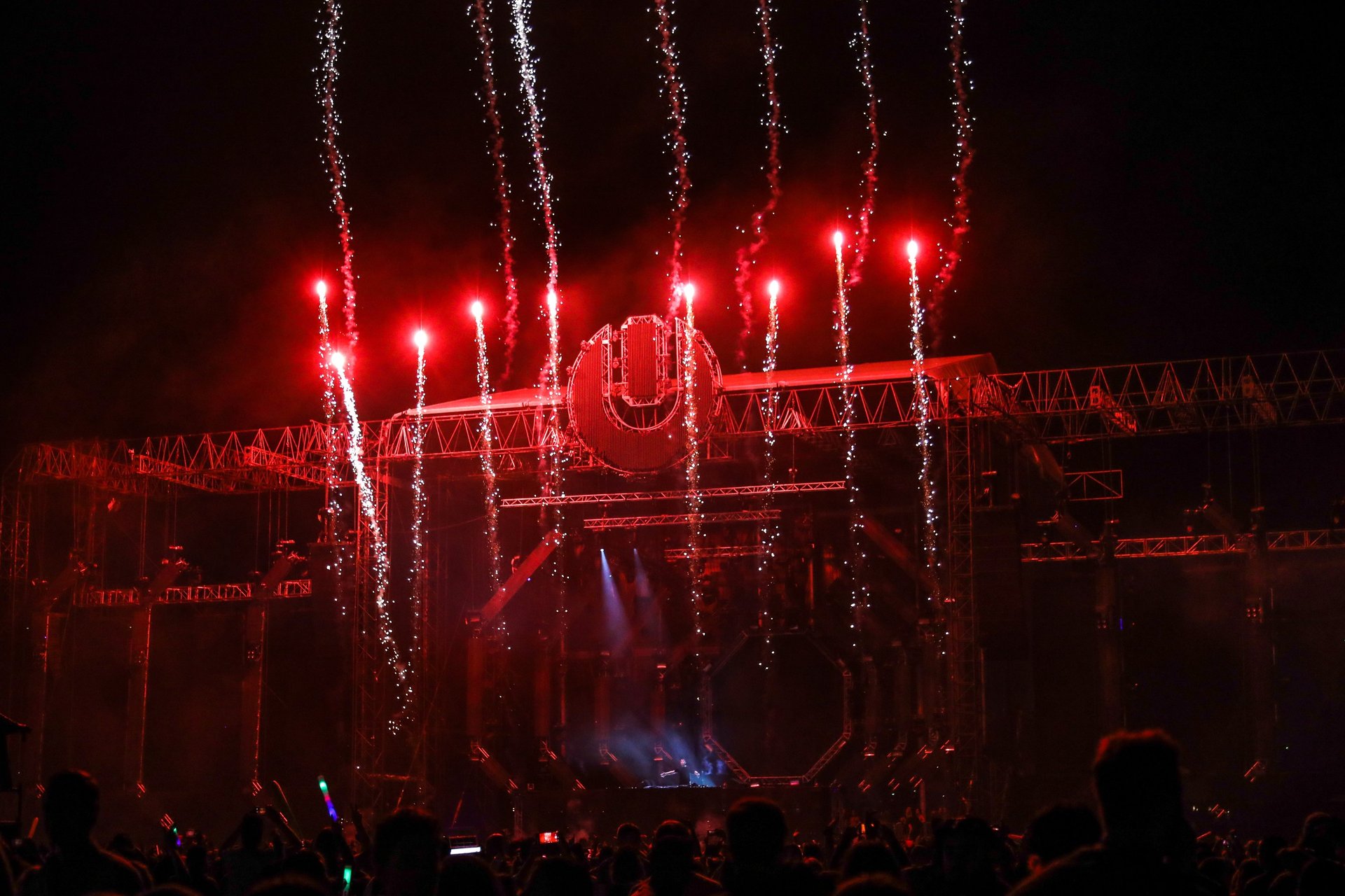 an abstract photo of a curved building with a blue sky in the background