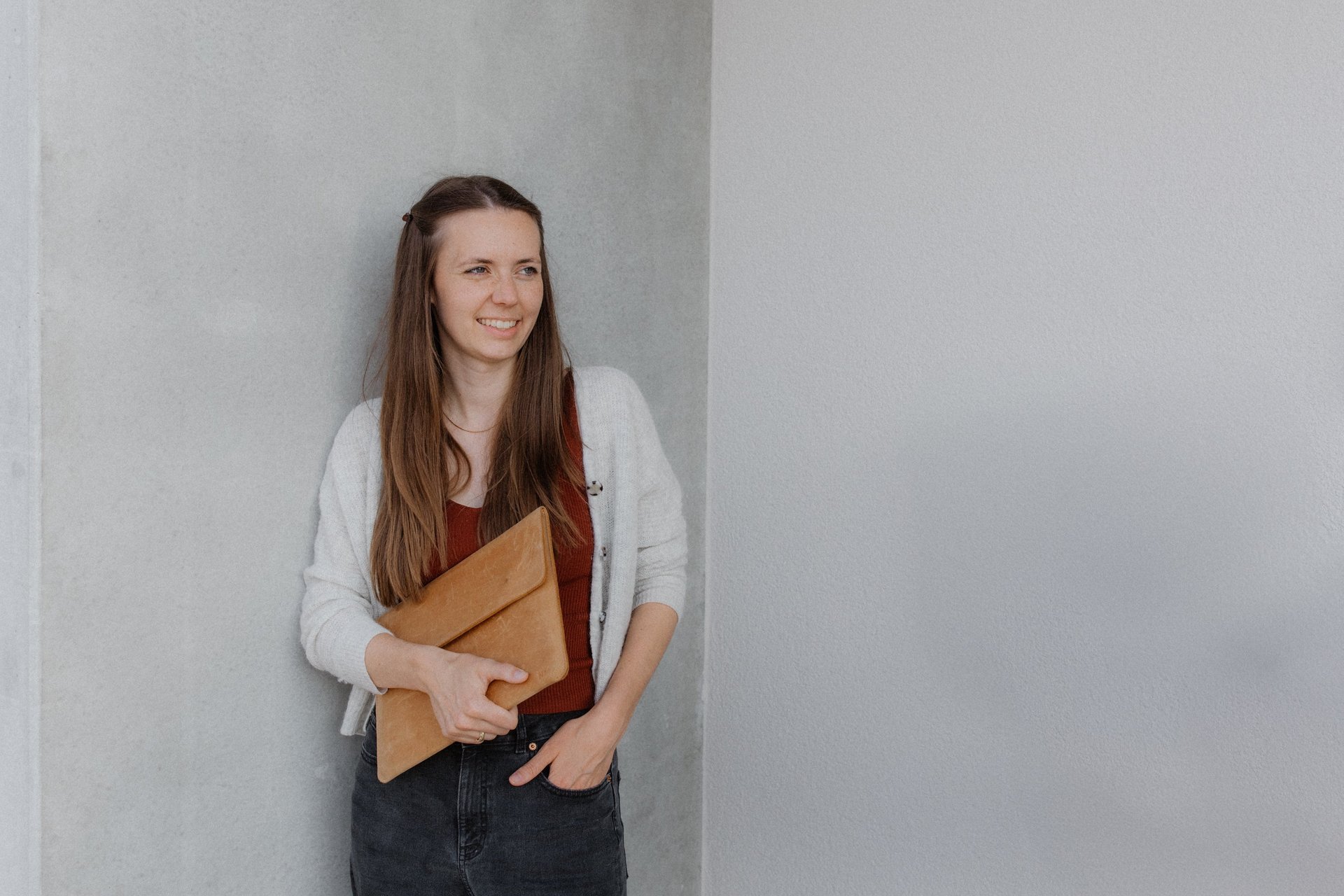 black and brown leather padded tub sofa