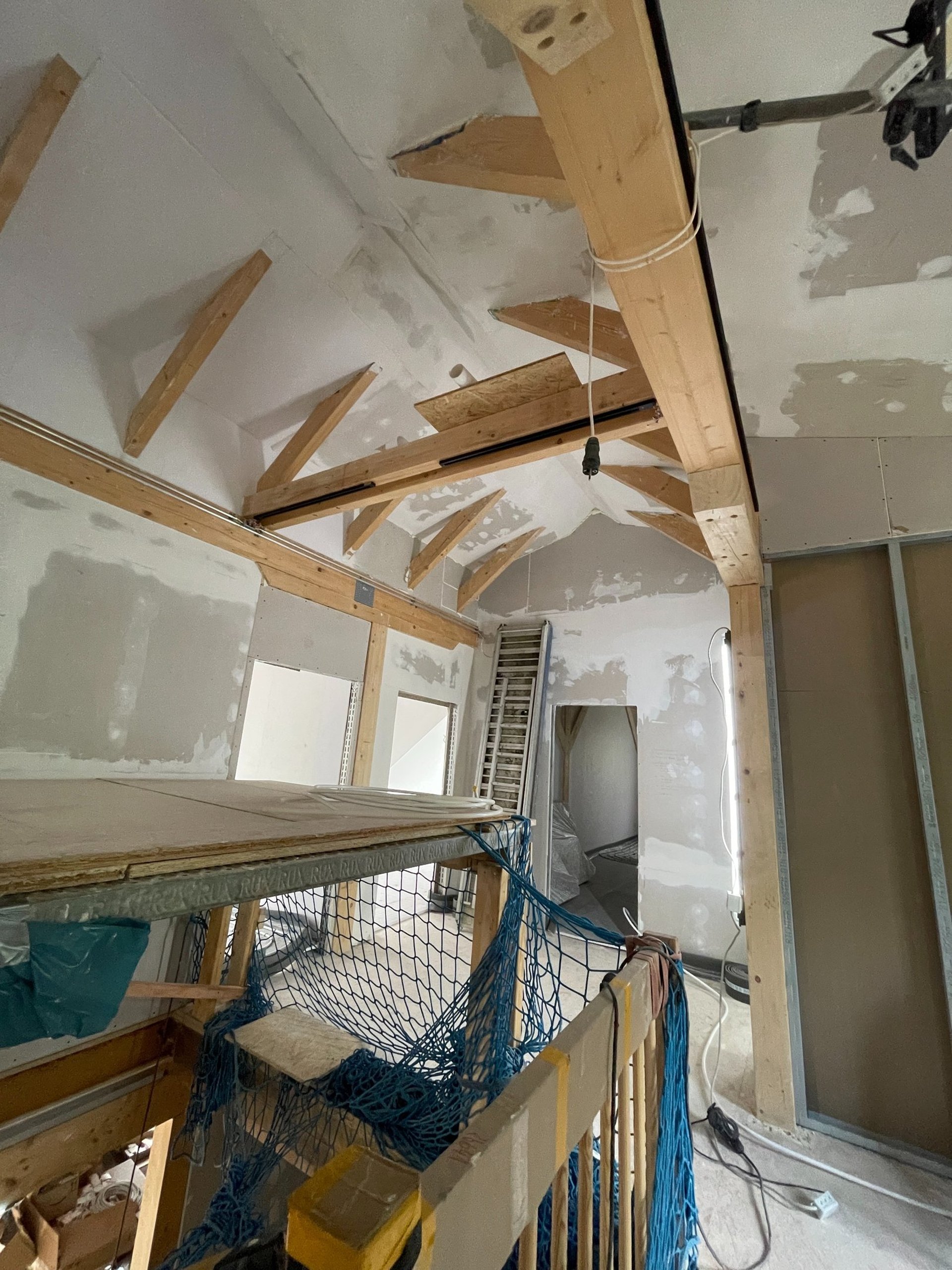 woman wearing yellow long-sleeved dress under white clouds and blue sky during daytime