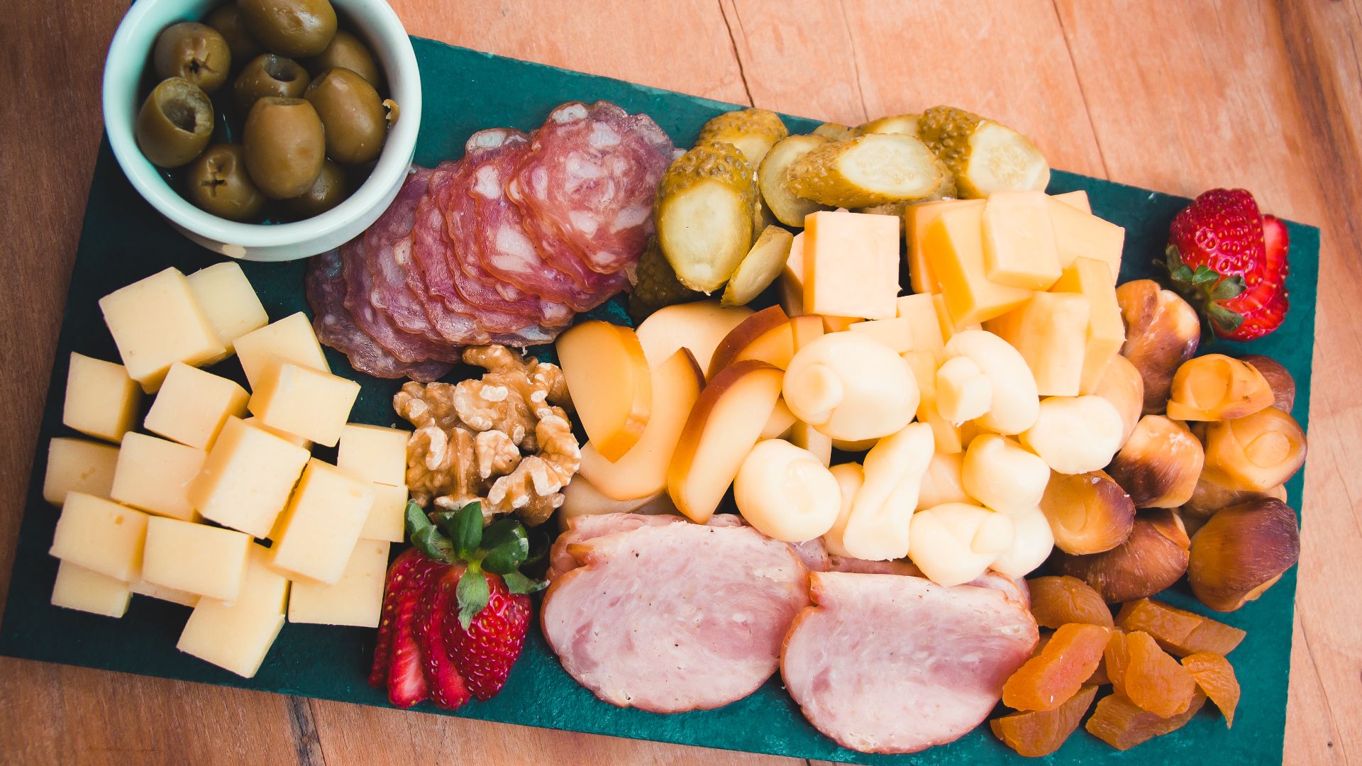 an abstract photo of a curved building with a blue sky in the background