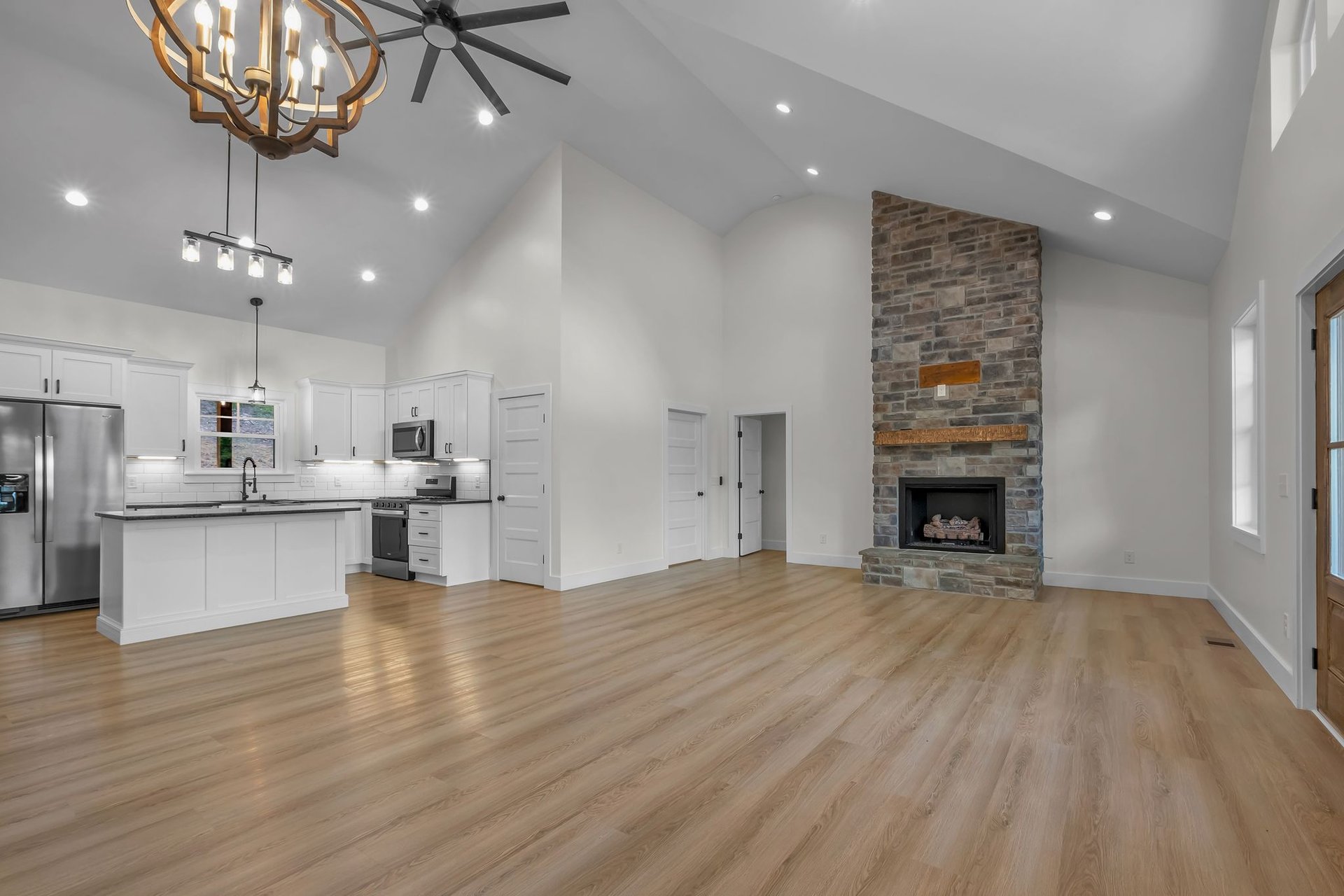 Custom built kitchen, living room and fireplace area