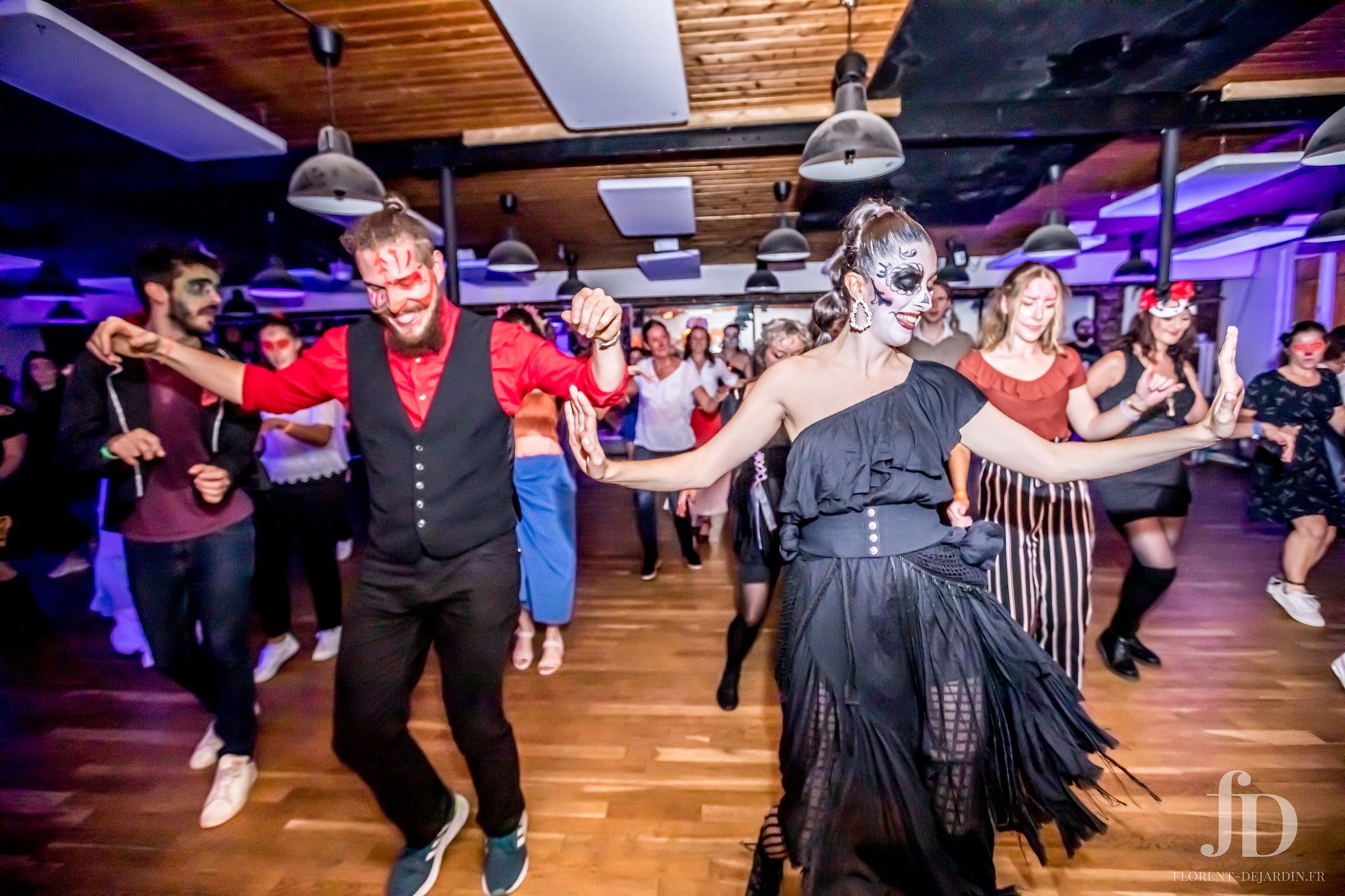 an abstract photo of a curved building with a blue sky in the background