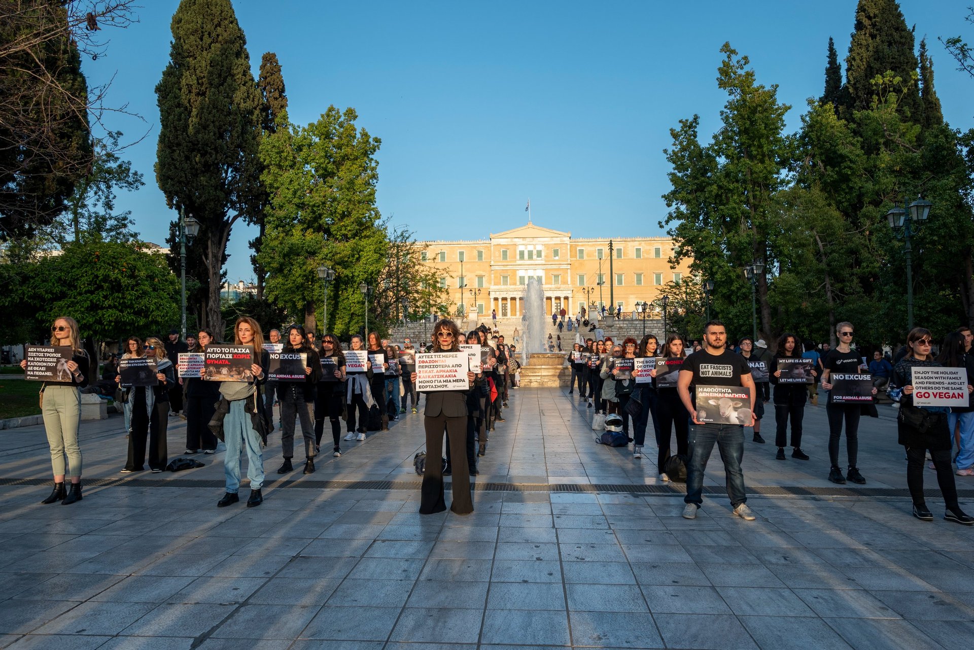 an abstract photo of a curved building with a blue sky in the background