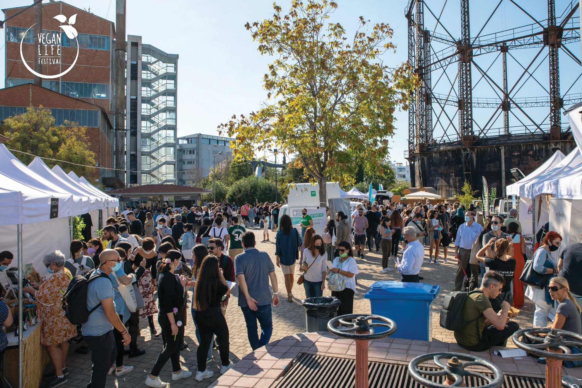 an abstract photo of a curved building with a blue sky in the background
