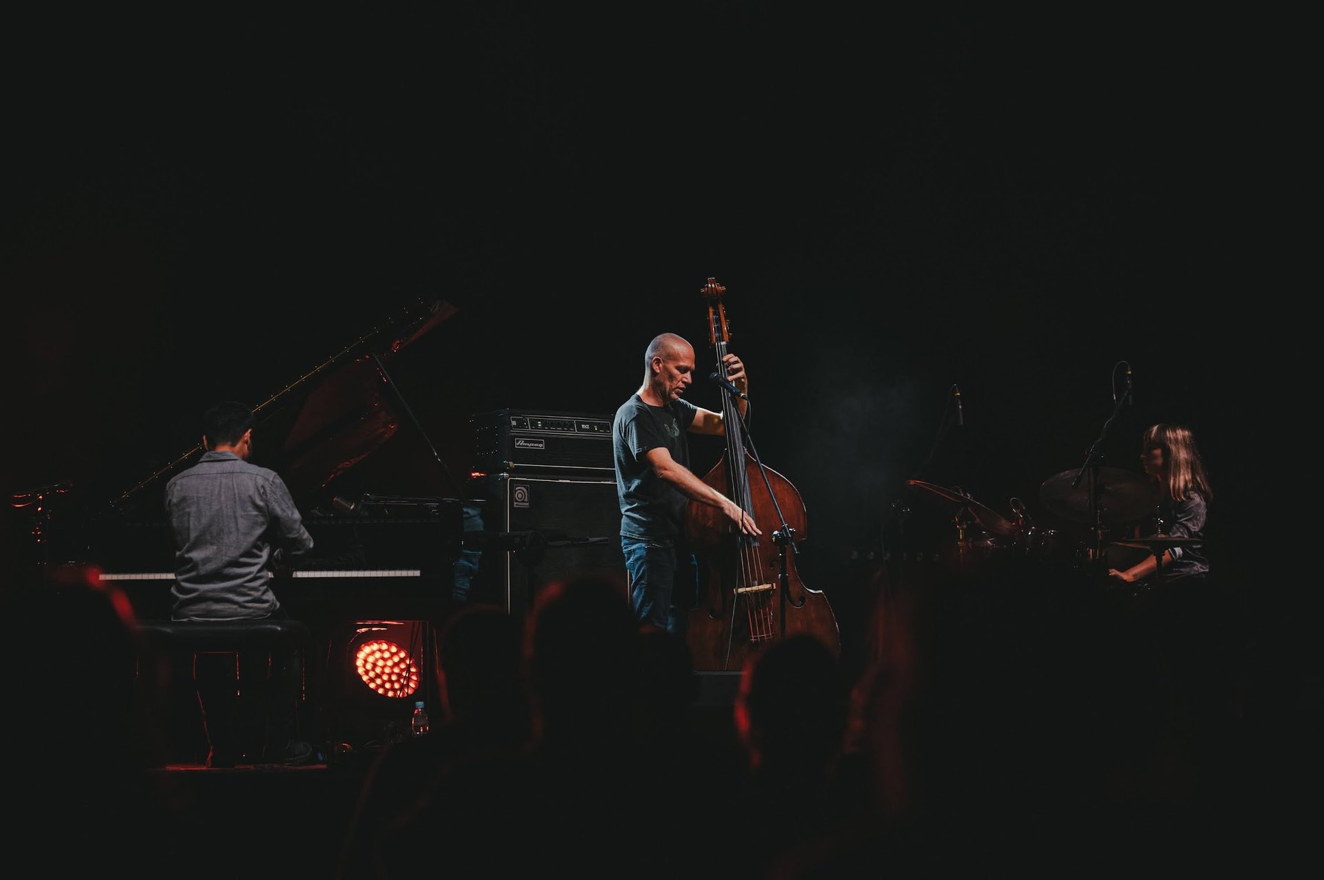woman wearing yellow long-sleeved dress under white clouds and blue sky during daytime