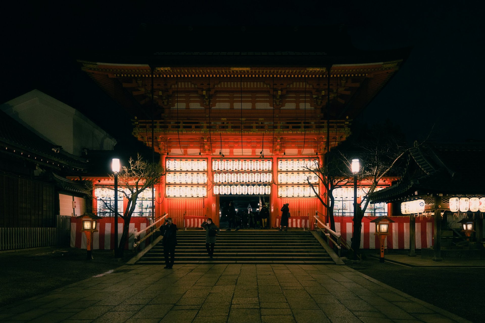 person taking picture of temple