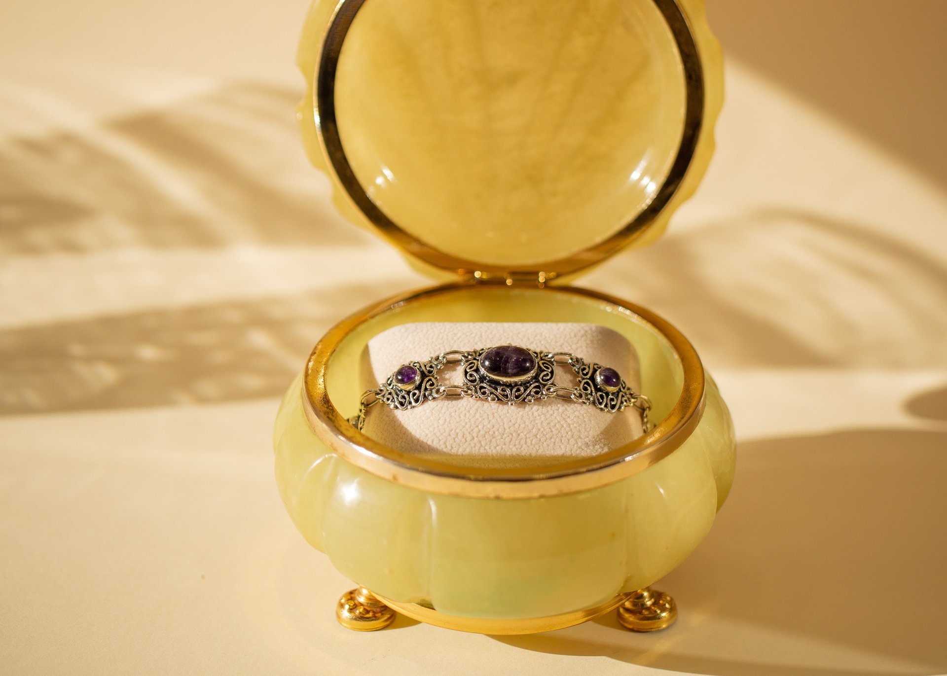 an abstract photo of a curved building with a blue sky in the background