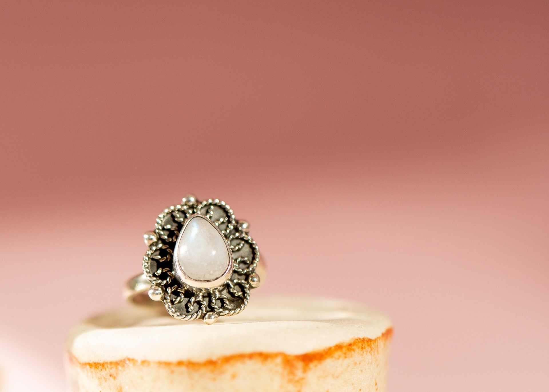 an abstract photo of a curved building with a blue sky in the background