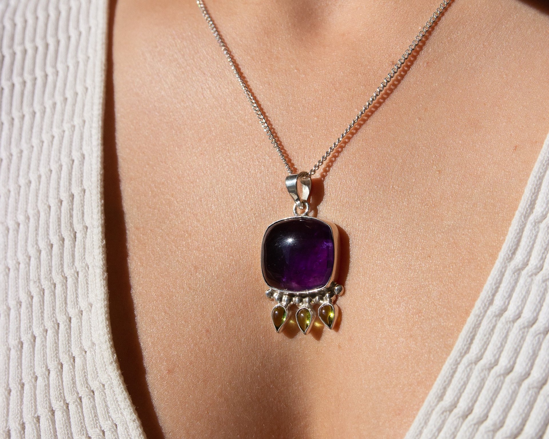 an abstract photo of a curved building with a blue sky in the background