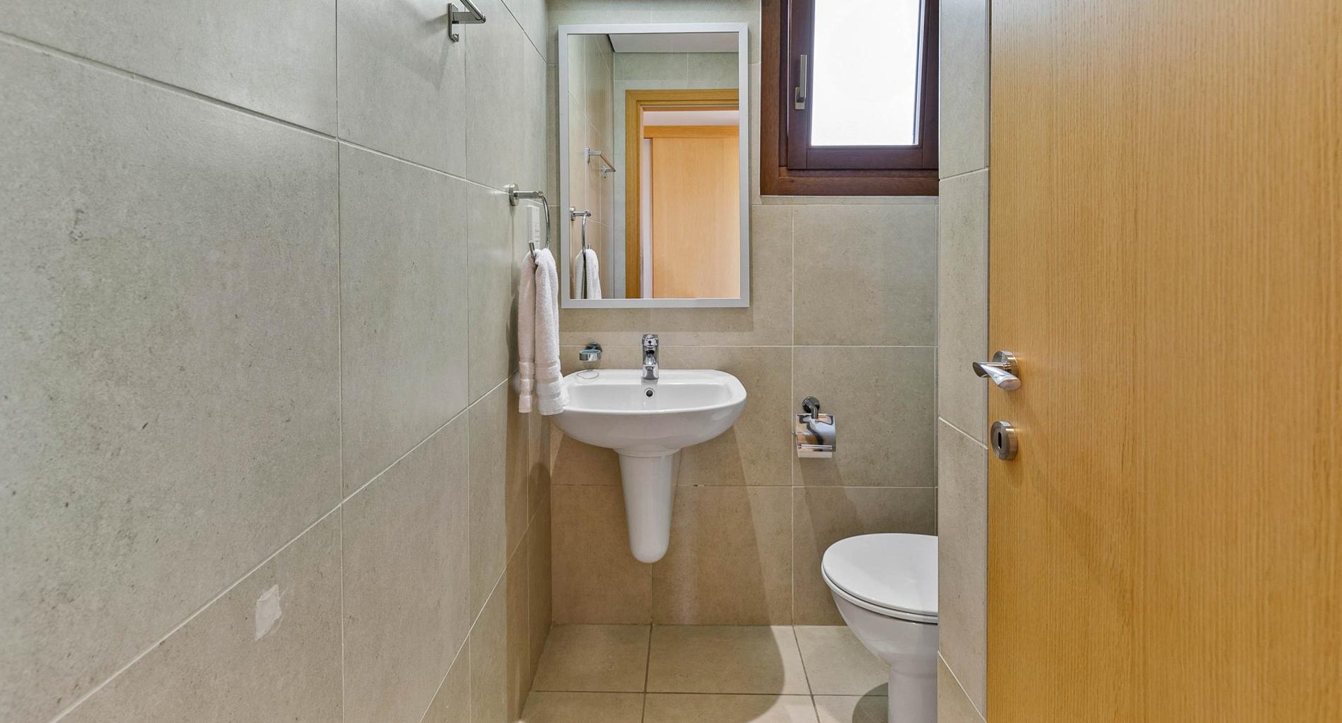 Guest bathroom with shower and infrared heater at Theseus Retreat holiday rental in Aphrodite Hills Resort, Cyprus