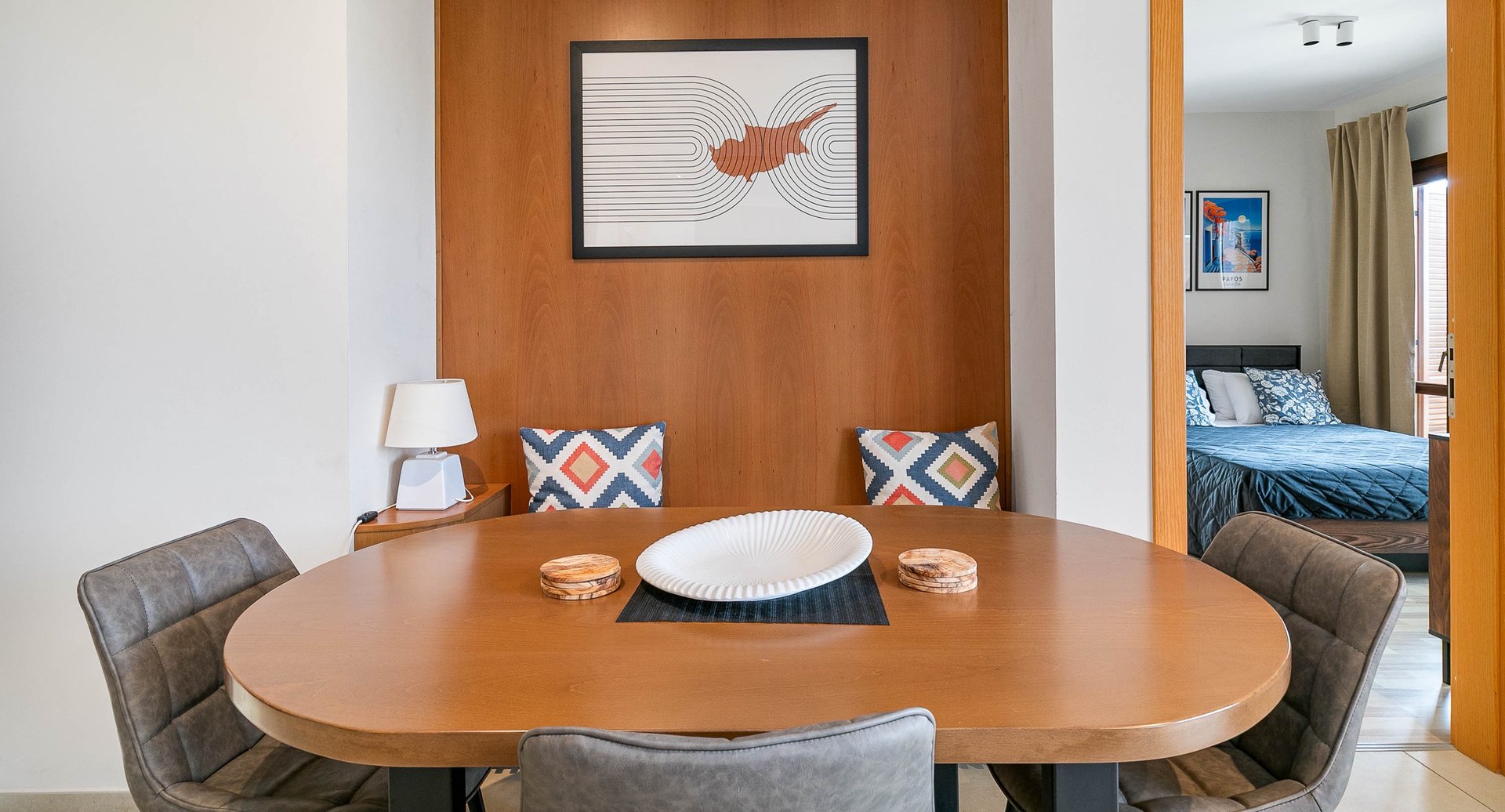 Dining table with view into the sea-view bedroom at Theseus Retreat holiday rental in Cyprus