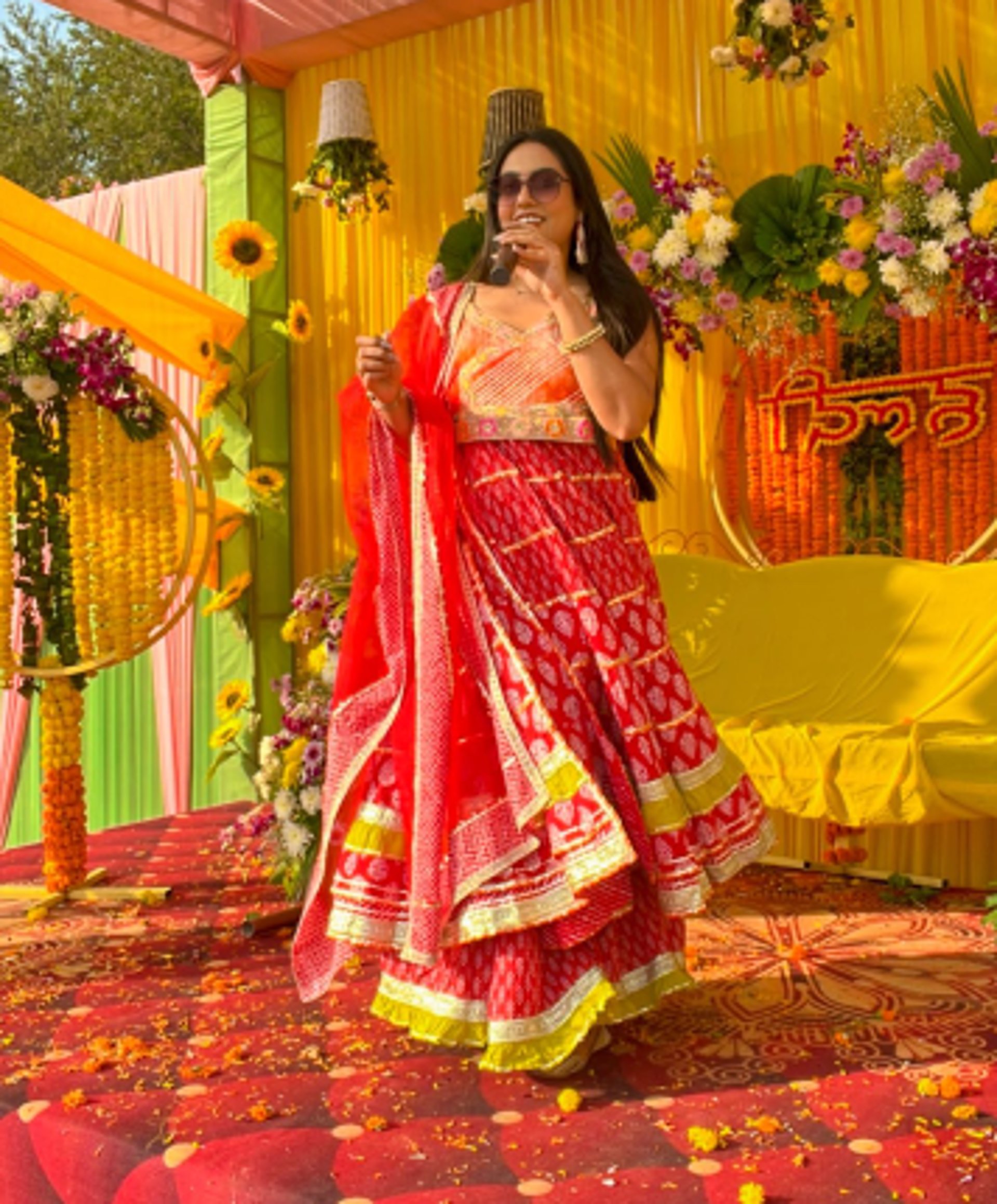 woman wearing yellow long-sleeved dress under white clouds and blue sky during daytime