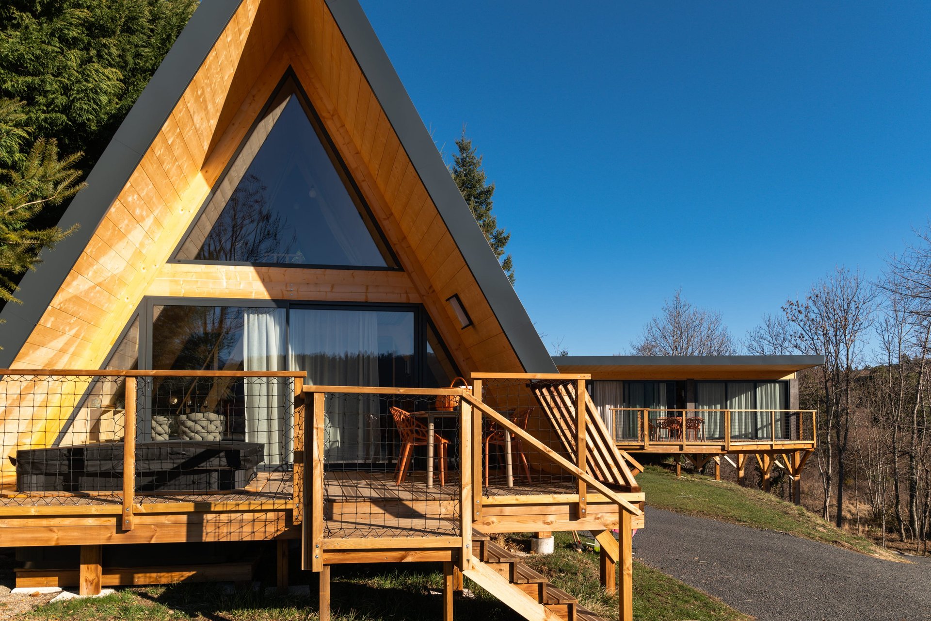 woman wearing yellow long-sleeved dress under white clouds and blue sky during daytime