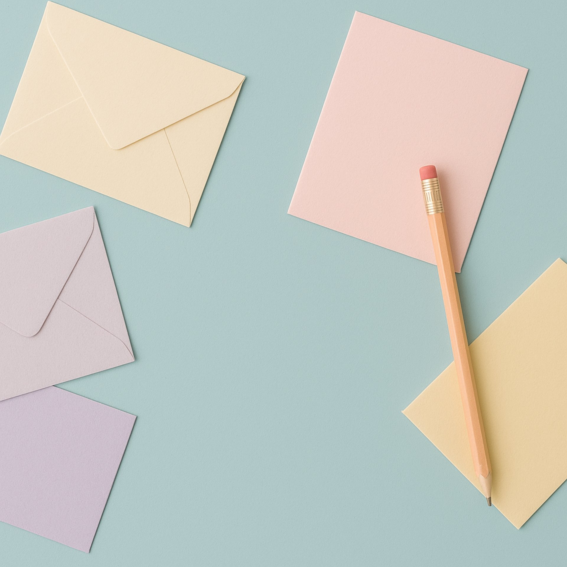 vintage teal typewriter beside book