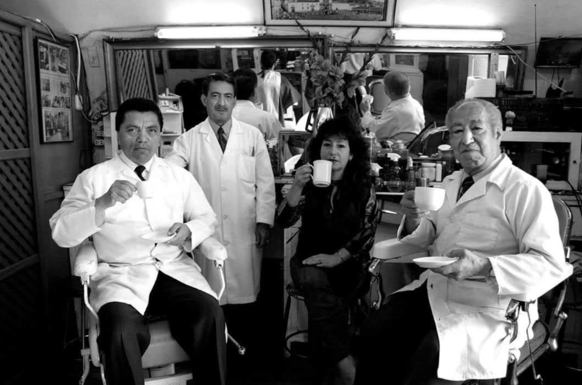 black and brown leather padded tub sofa