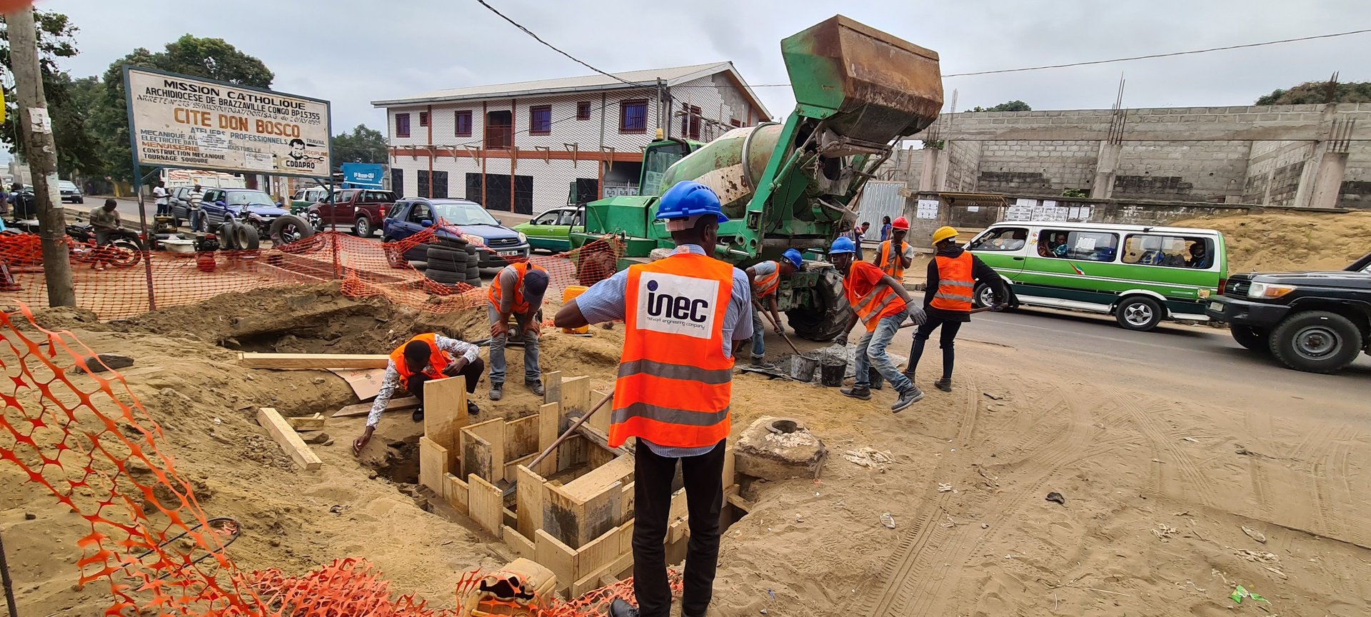 black metal ladder leaning on white wall