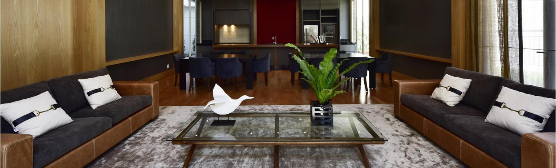 black and brown leather padded tub sofa