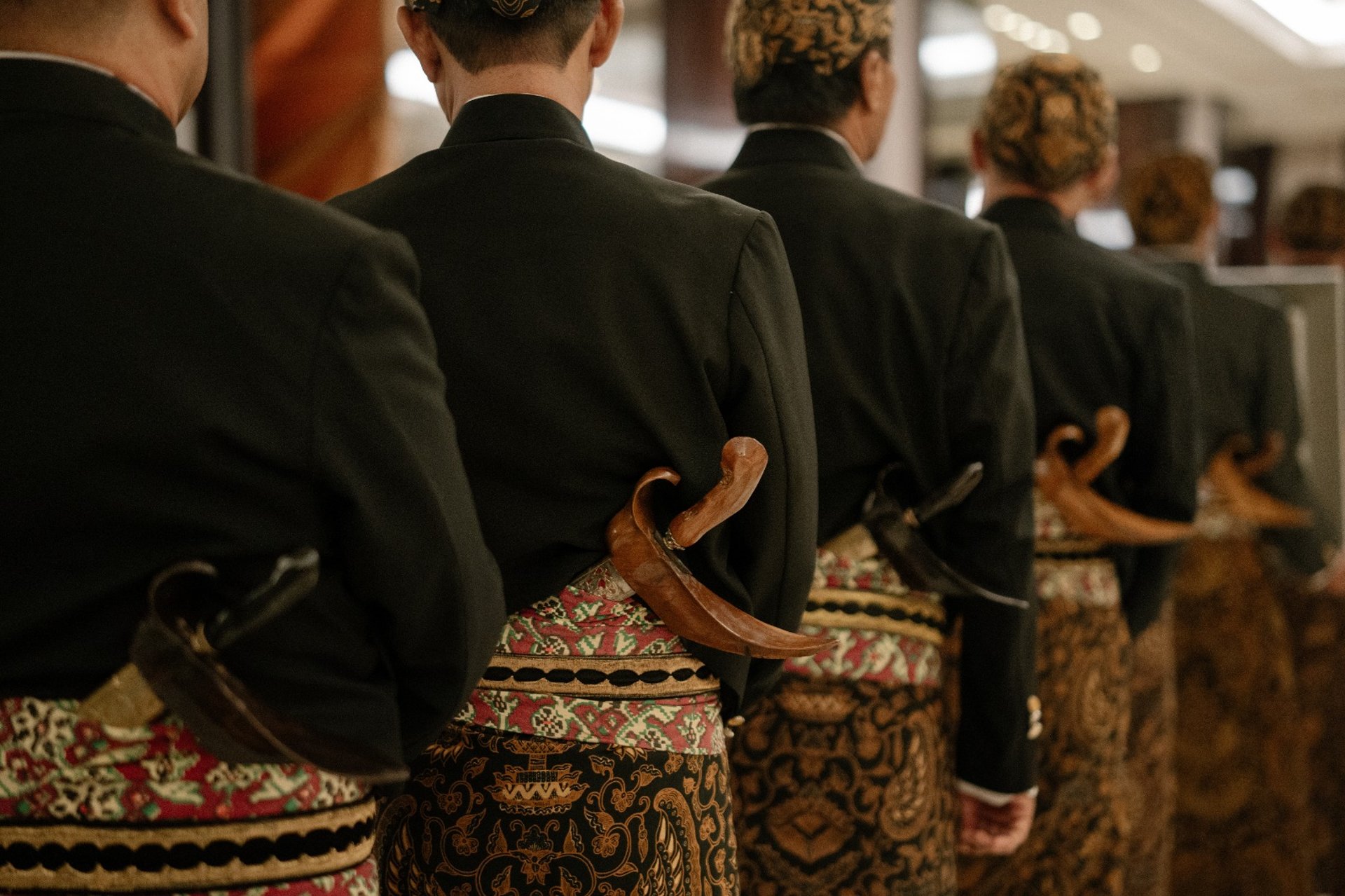 black and brown leather padded tub sofa