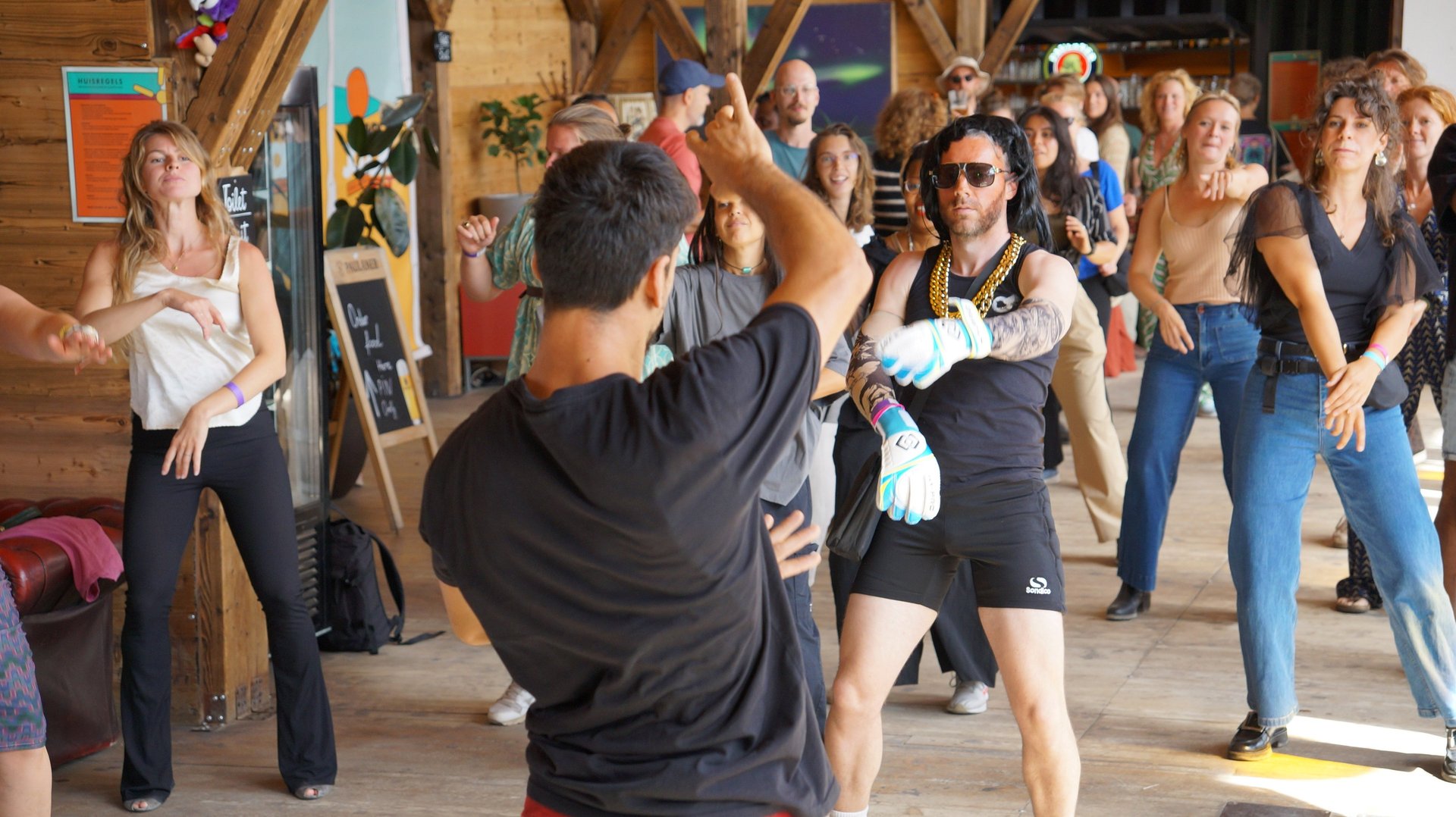 green grass field with brown tree during daytime