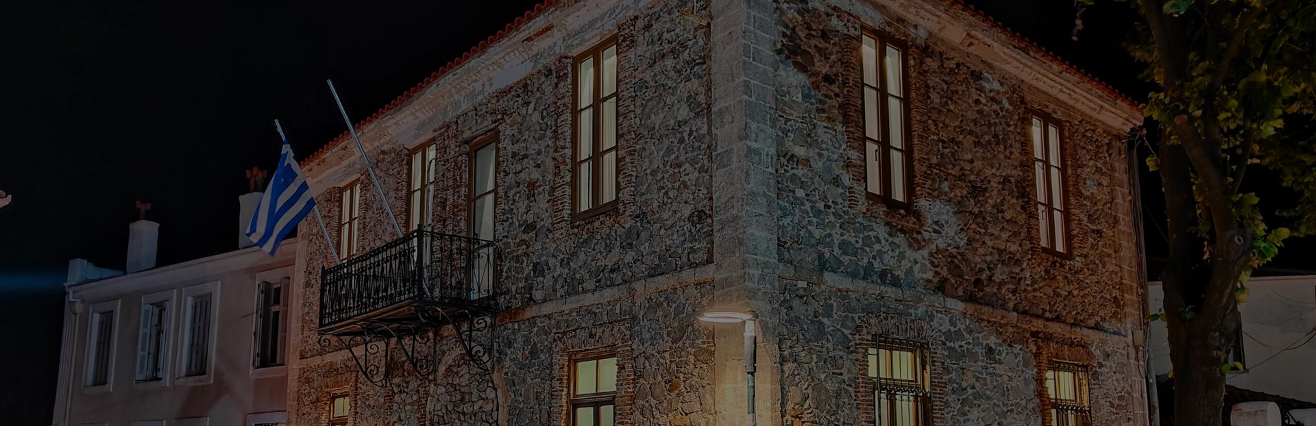 an abstract photo of a curved building with a blue sky in the background
