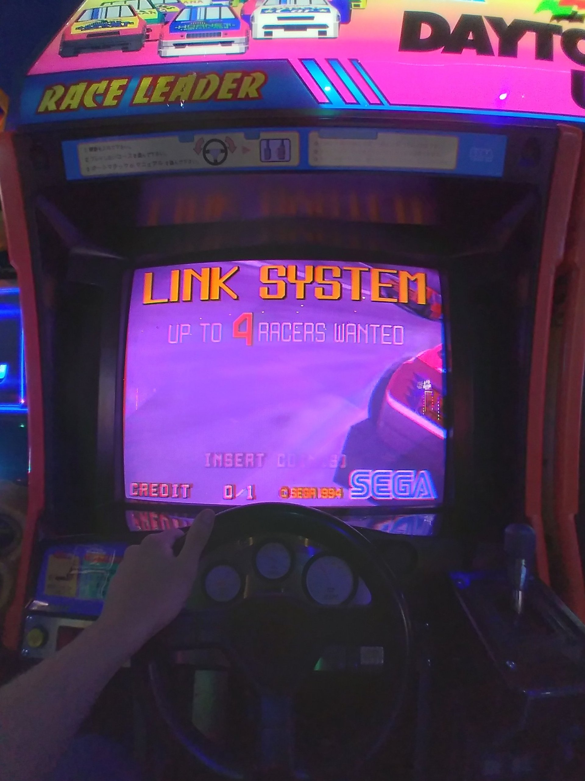 blue and white store with lights turned on during night time