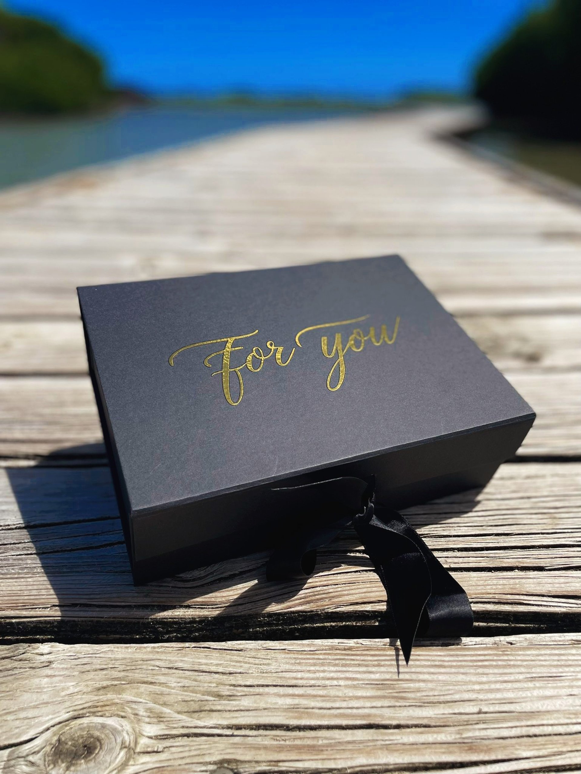 woman wearing yellow long-sleeved dress under white clouds and blue sky during daytime