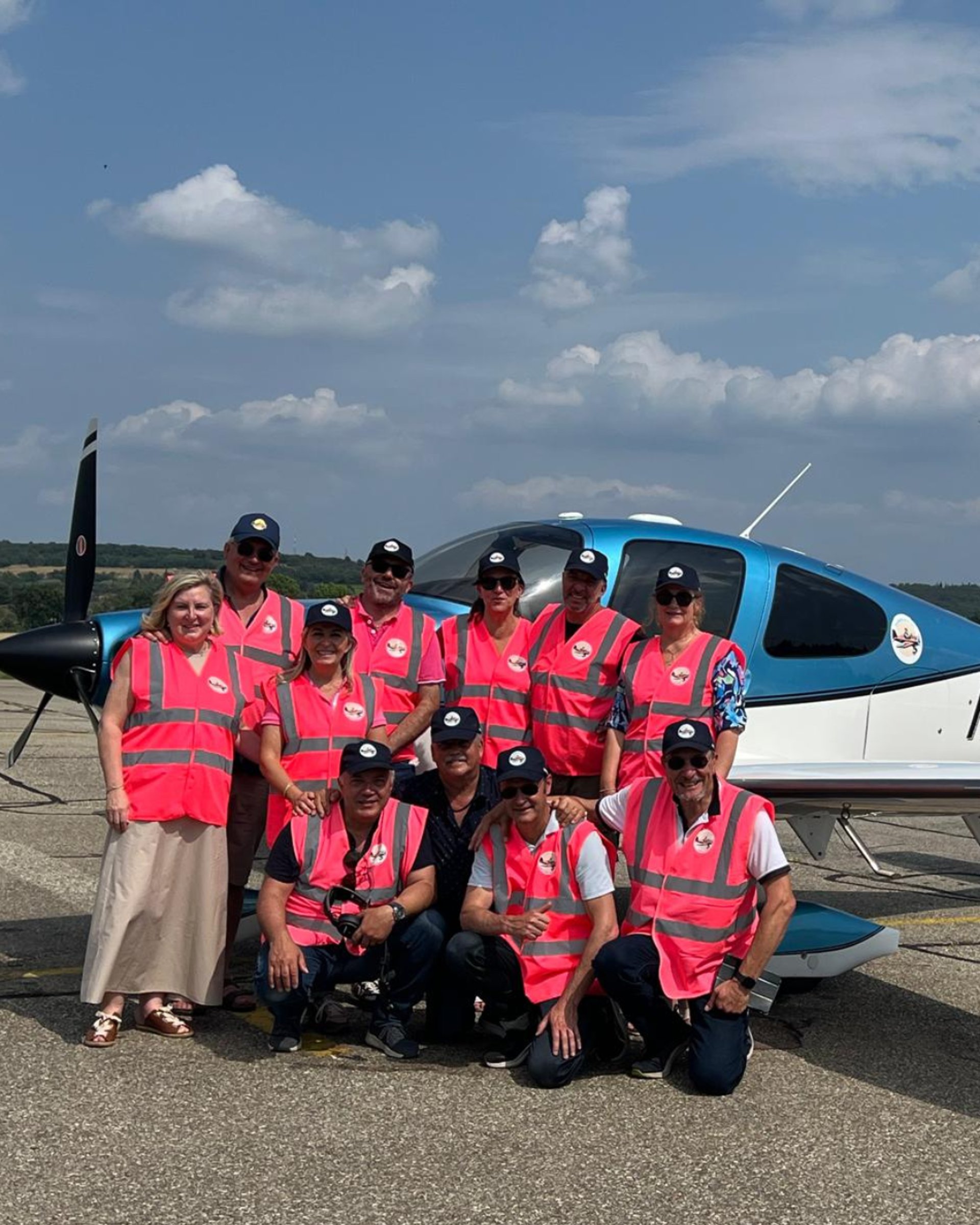 white and red airplane under blue sky during daytime