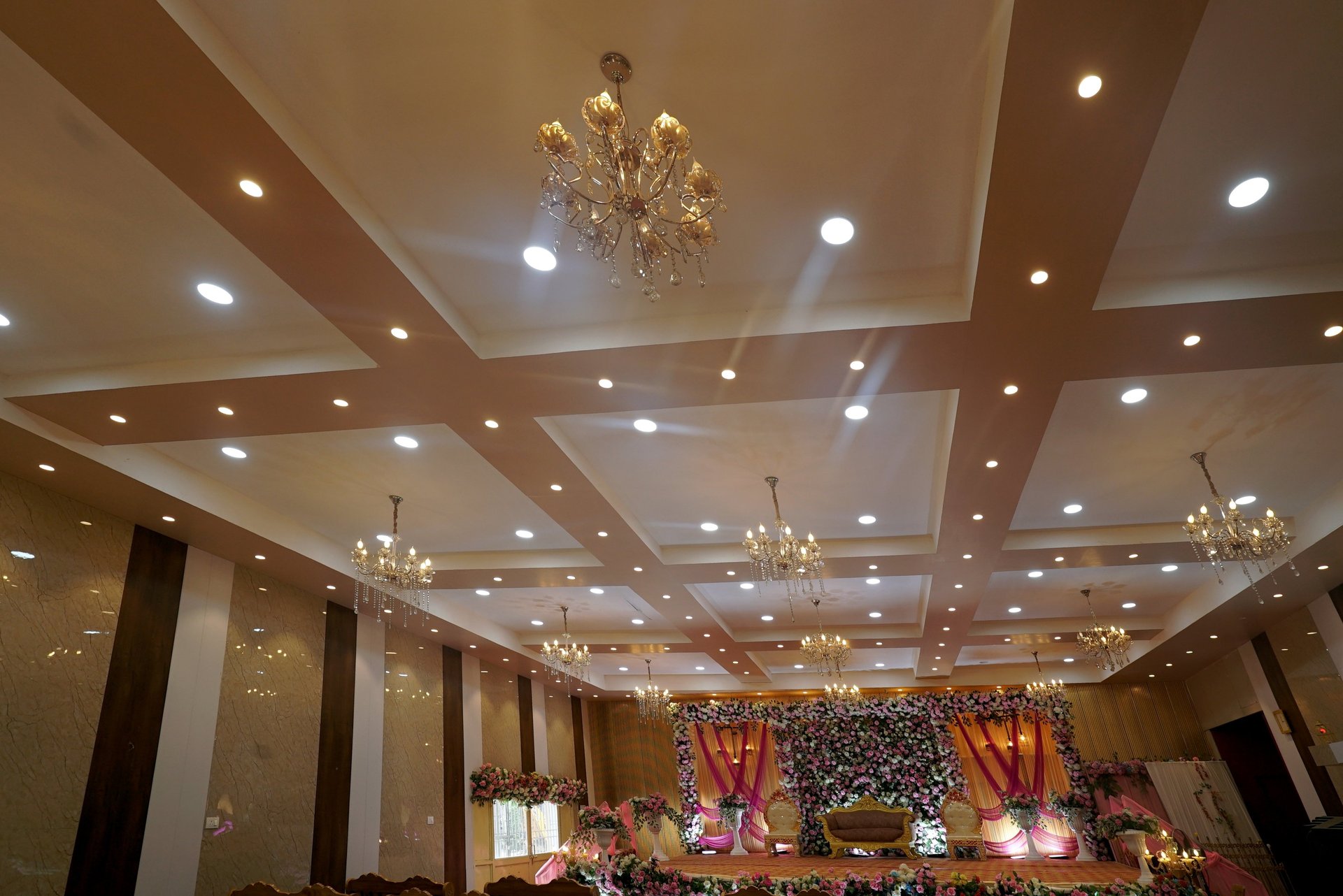three clear glass chandeliers