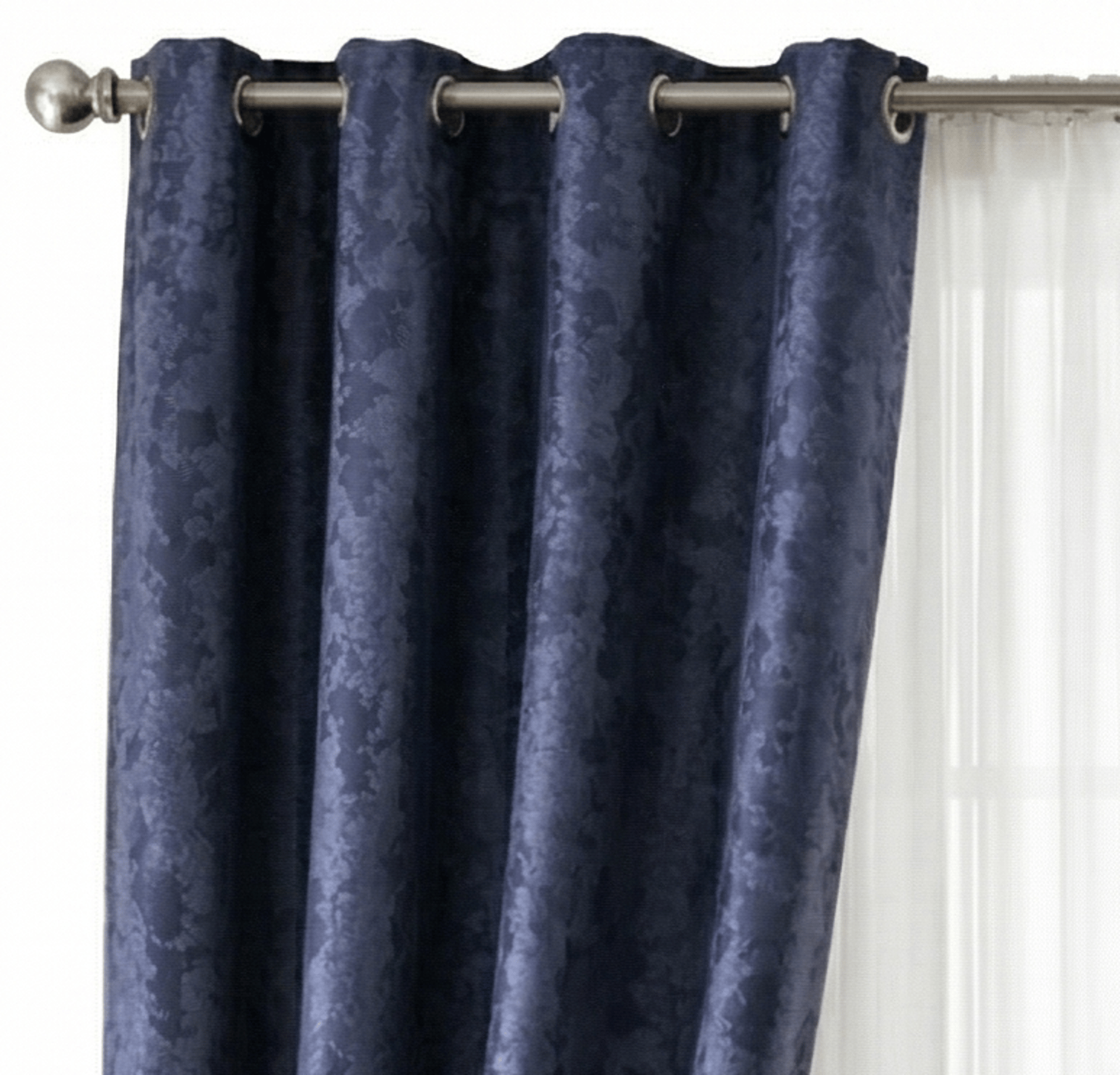 an abstract photo of a curved building with a blue sky in the background