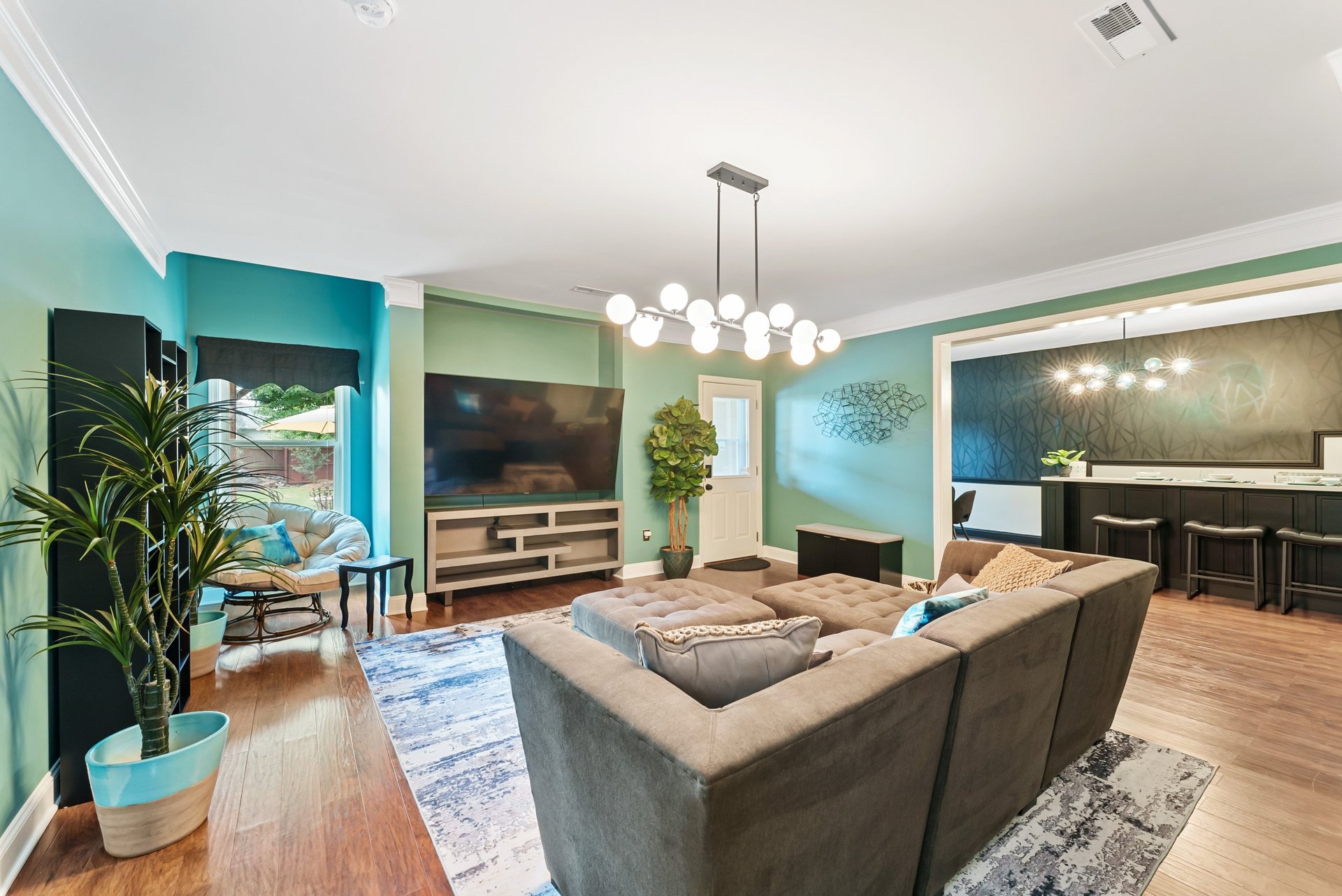 black and brown leather padded tub sofa